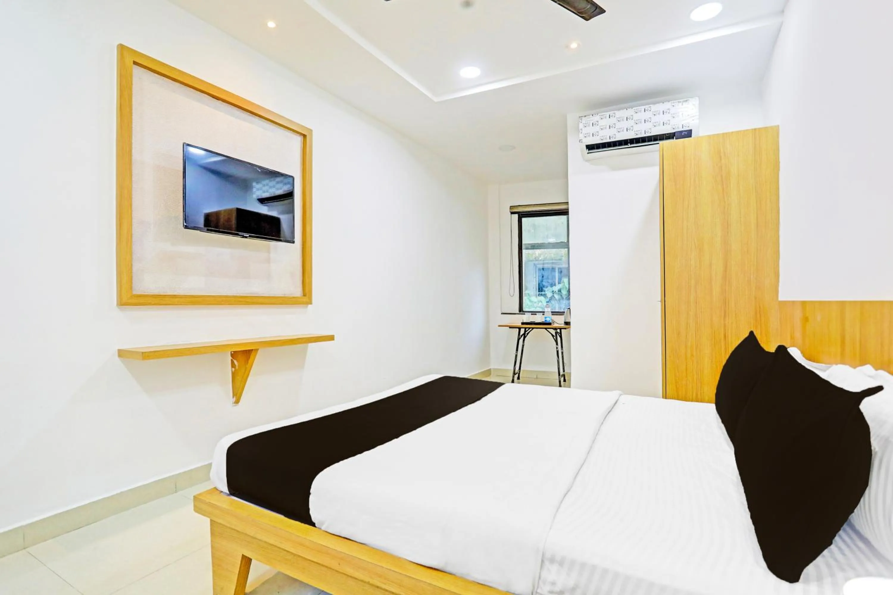 Bedroom, Bed in Super Hotel O Raipur