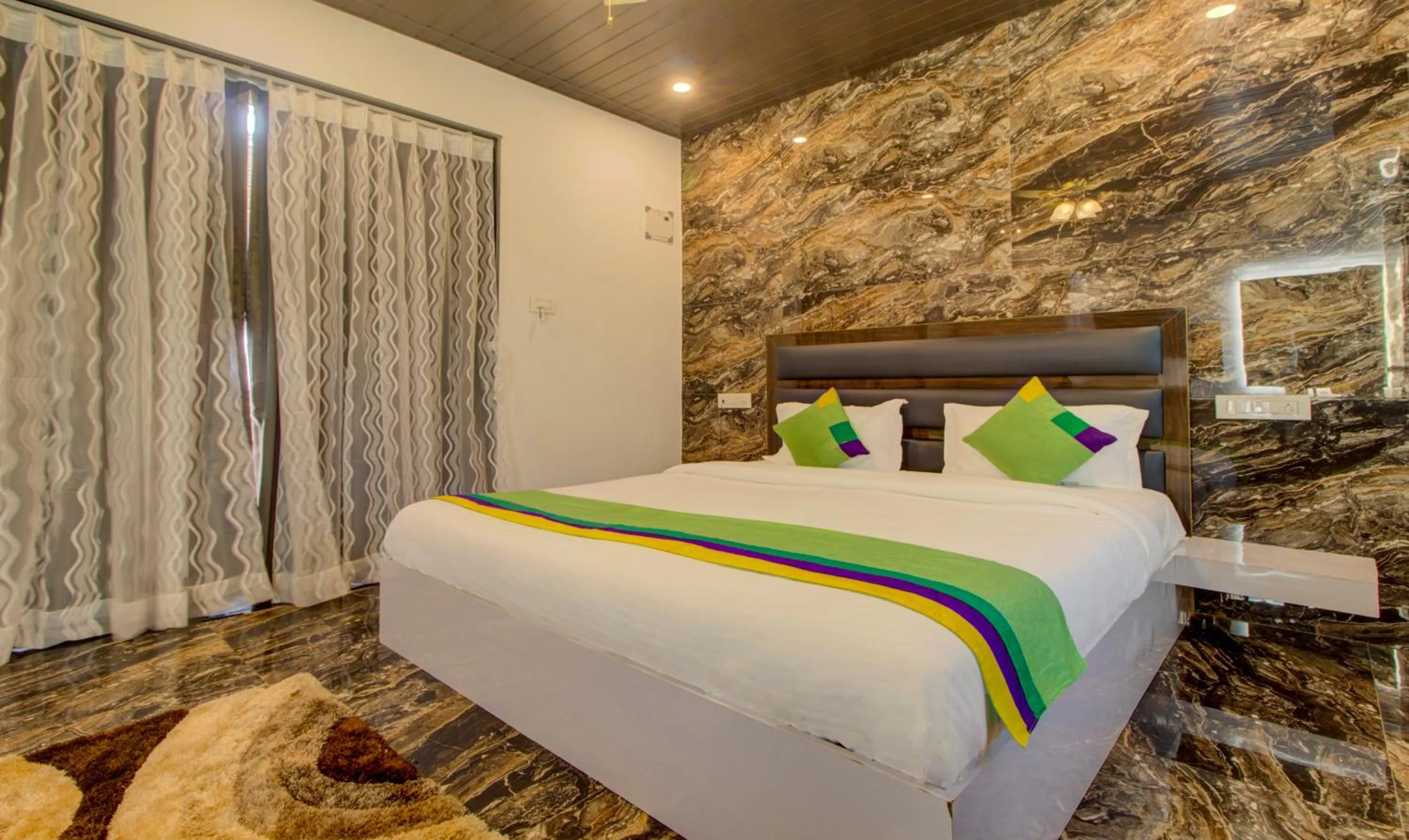 Bed in Treebo Code Red