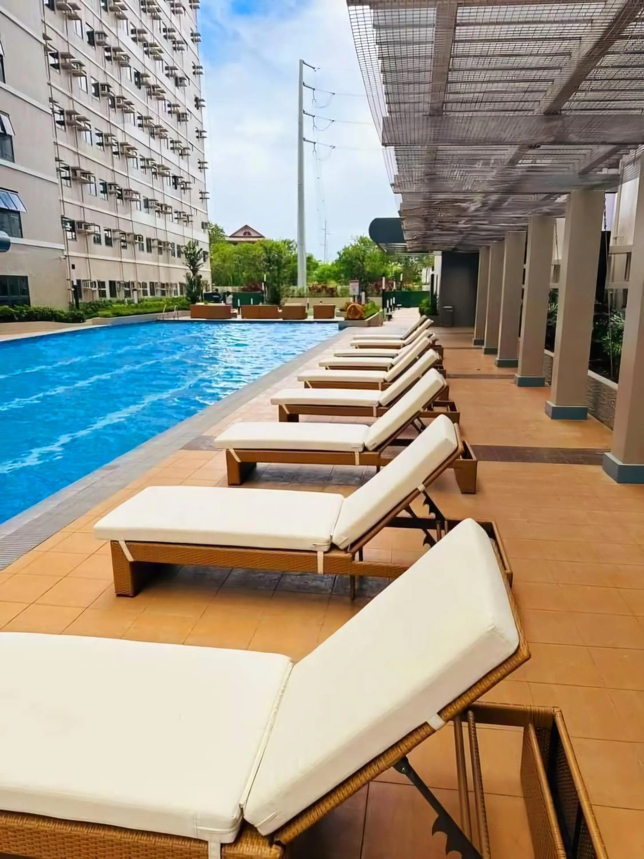 Swimming pool in Acellyne's Suites at Green 2 Residences with Netflix!