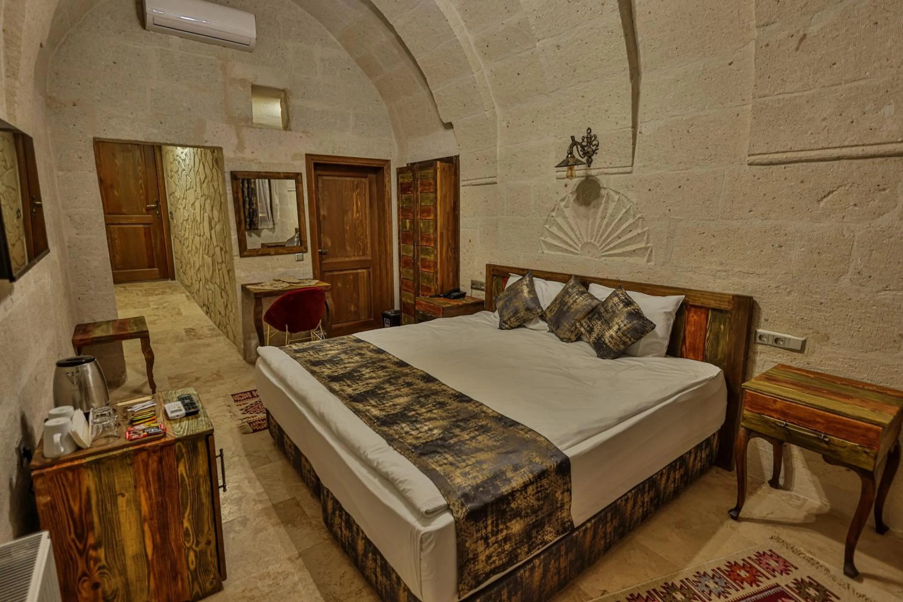 Bed in CaveAdocia Stone&Cave Hotel