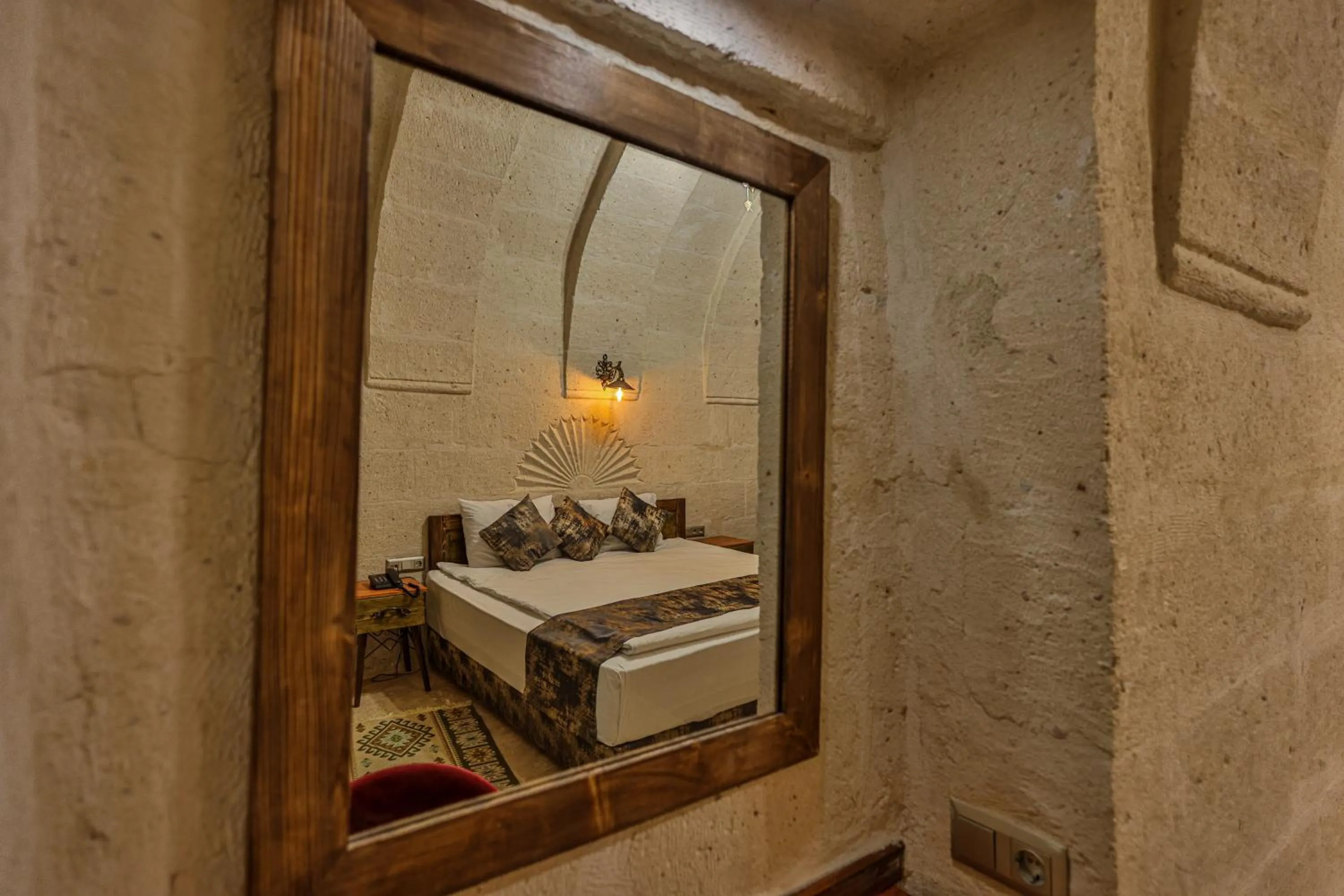 Photo of the whole room, Bed in CaveAdocia Stone&Cave Hotel