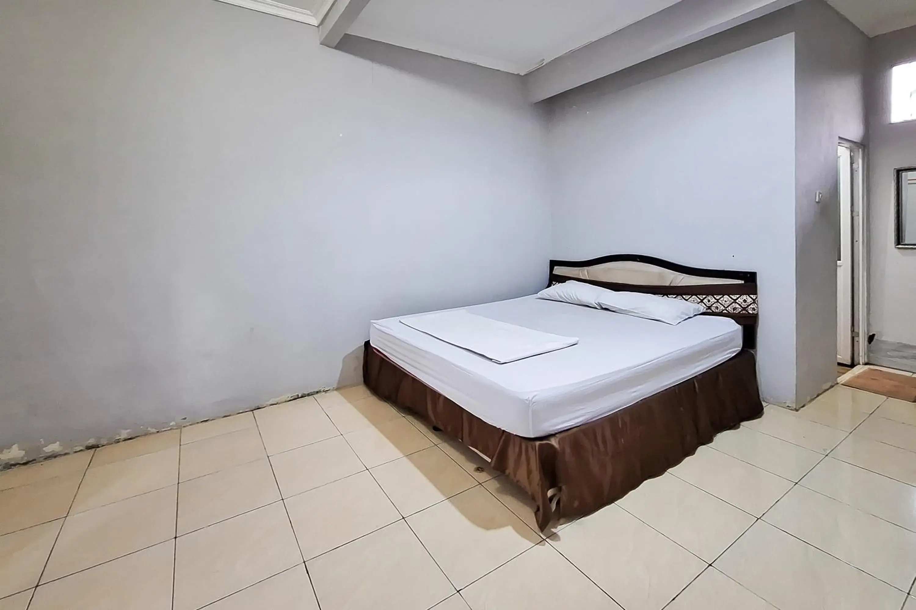 Bedroom, Bed in RedDoorz at Kampung Istal Bogor Bedroom, Bed in RedDoorz at Kampung Istal Bogor