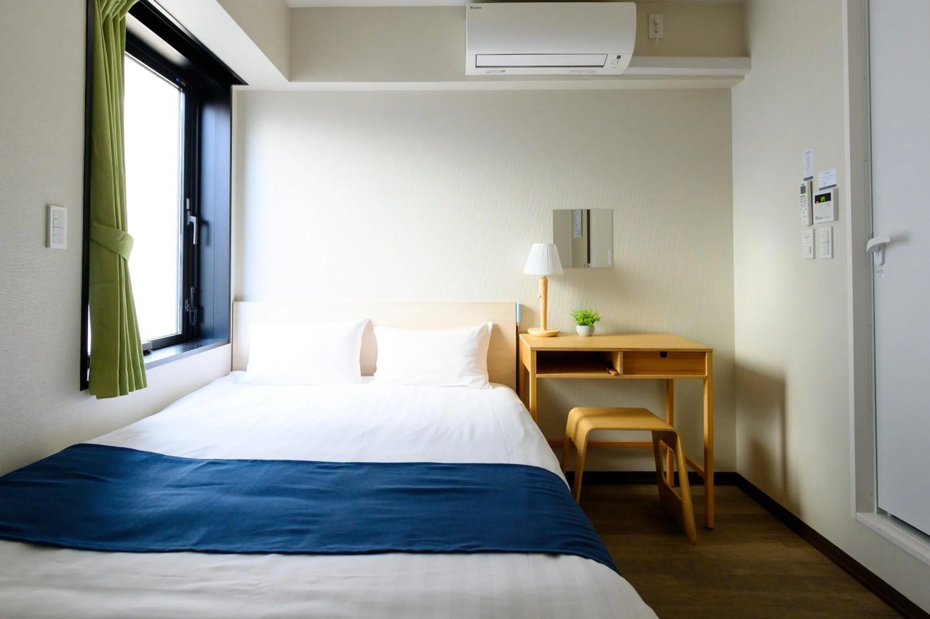 Bed in Ueno Woo Hotel