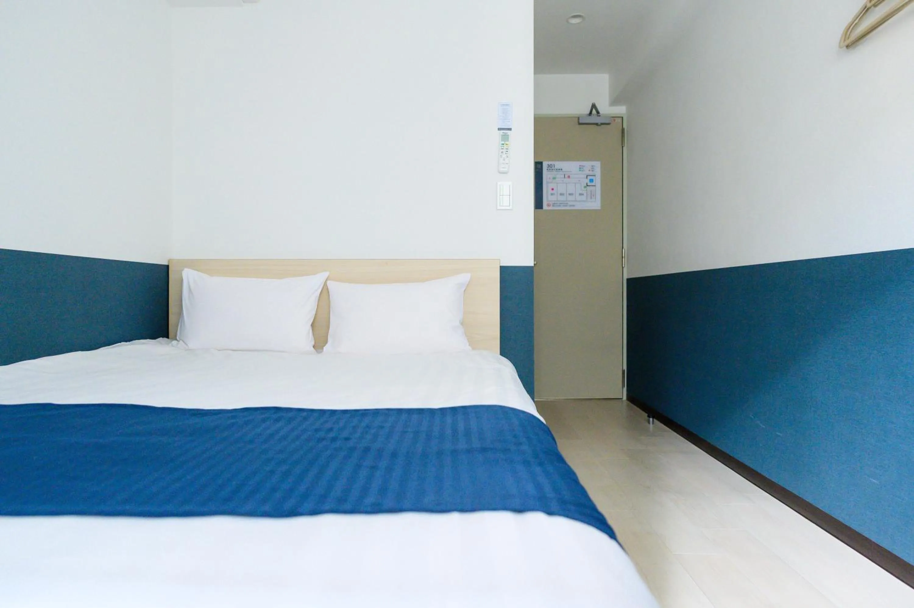 Bed in Ueno Woo Hotel