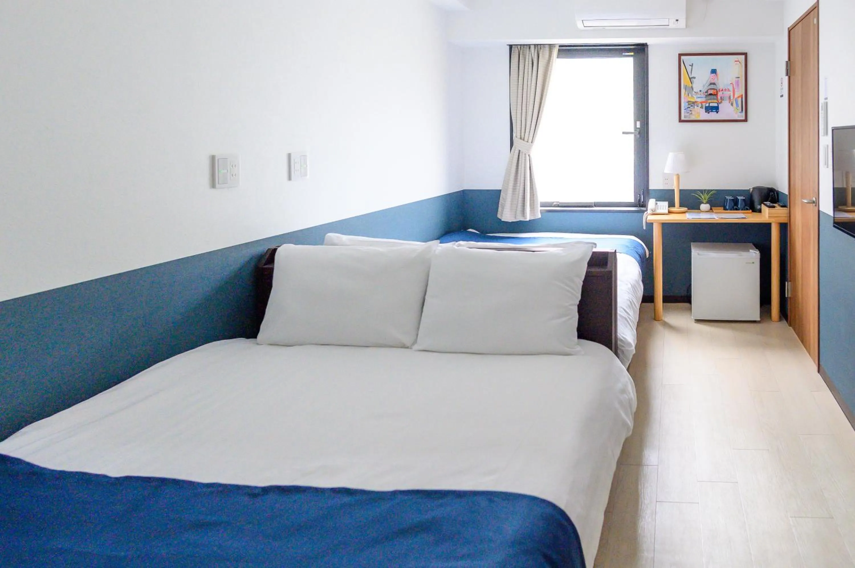 Bed in Ueno Woo Hotel