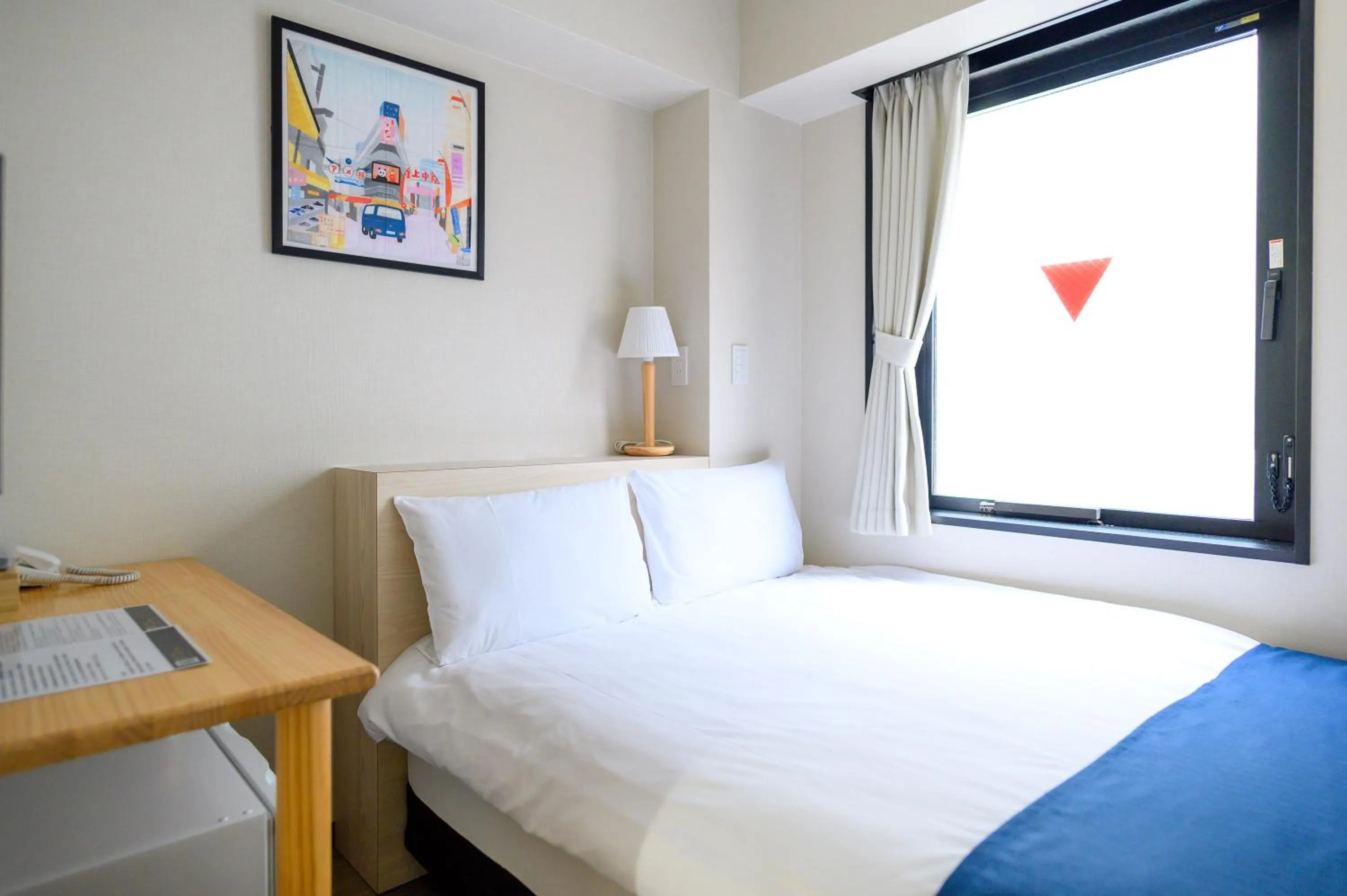 Bed in Ueno Woo Hotel