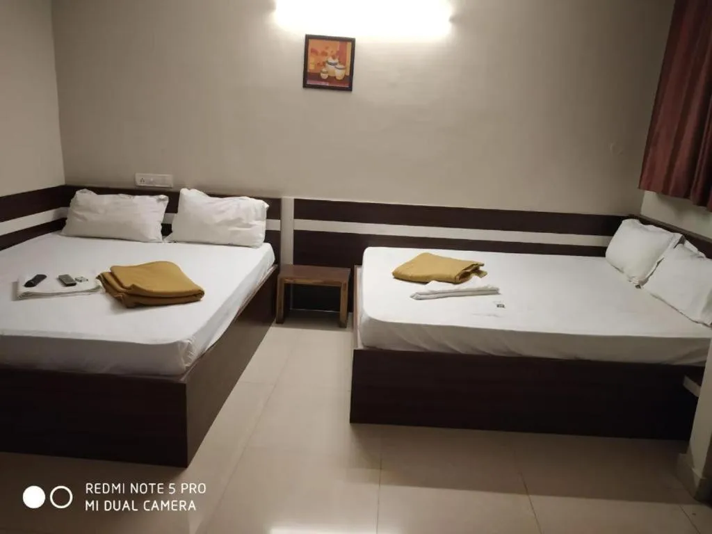 Bedroom, Bed in Parkwood Executive Rooms Inn