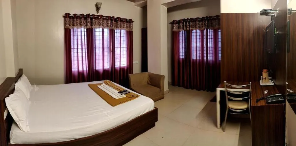 Bedroom, Bed in Parkwood Executive Rooms Inn