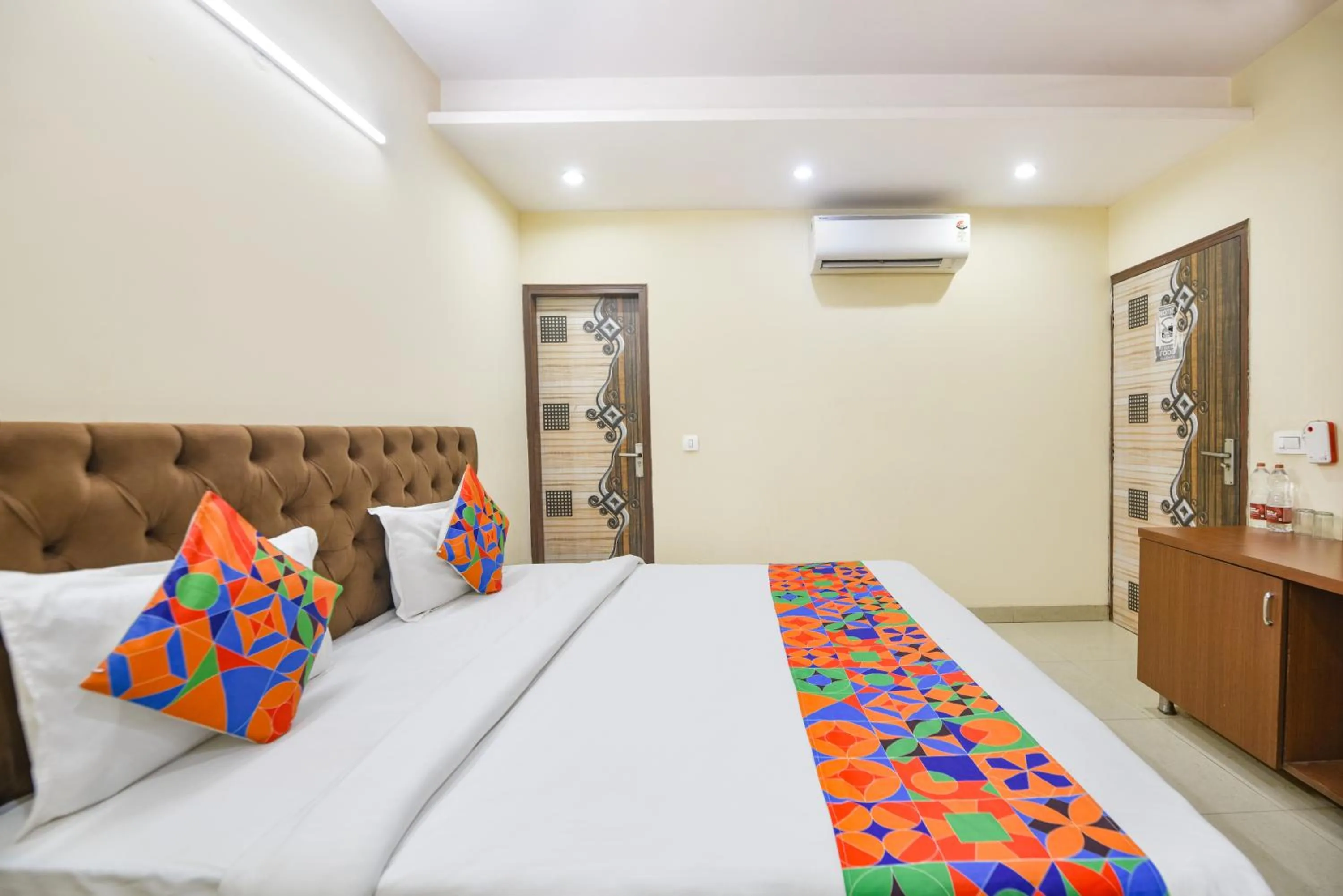 Bed in FabHotel Mannat Bhera Enclave
