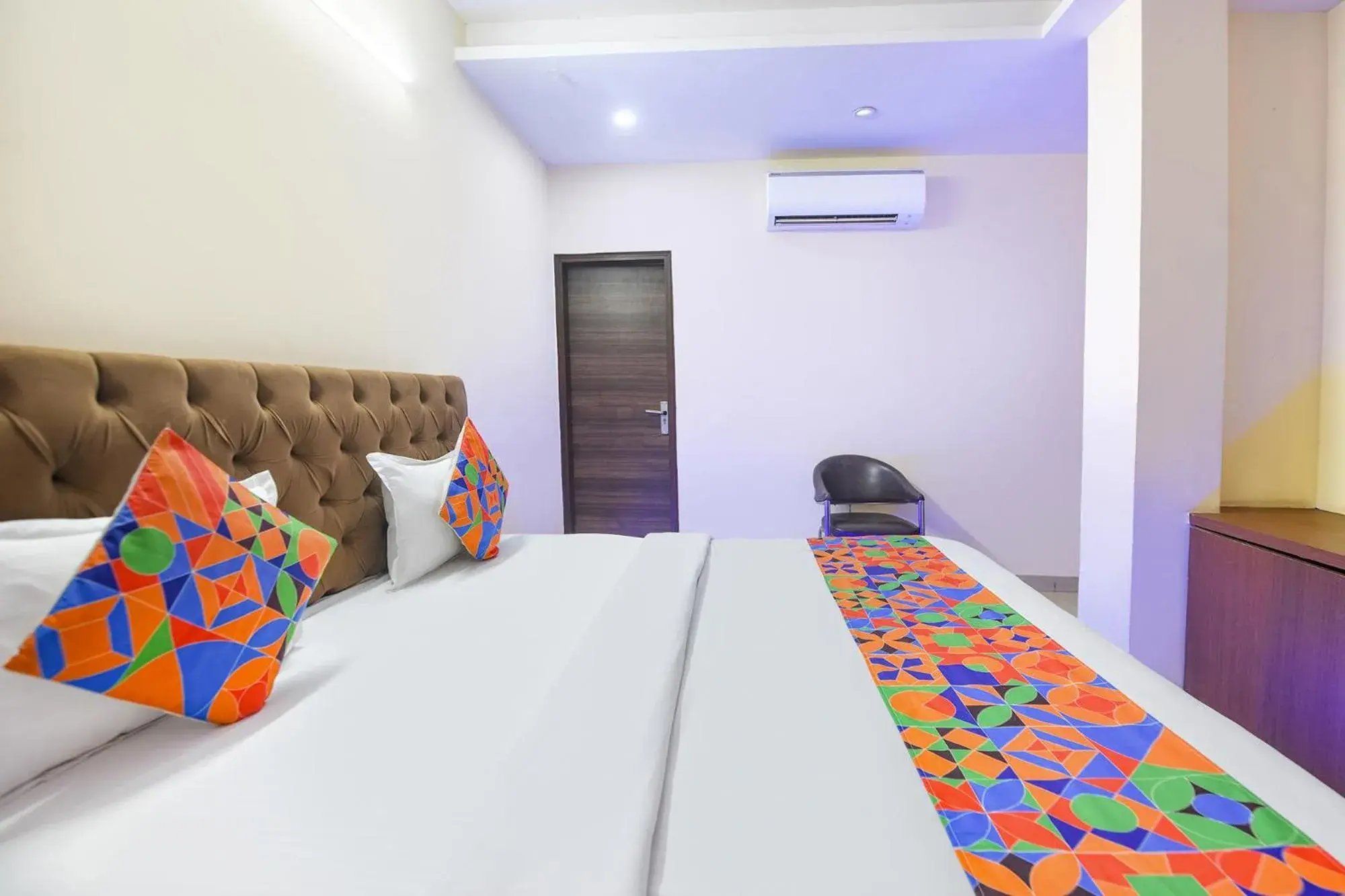 Bedroom in FabHotel Mannat Bhera Enclave Bedroom in FabHotel Mannat Bhera Enclave