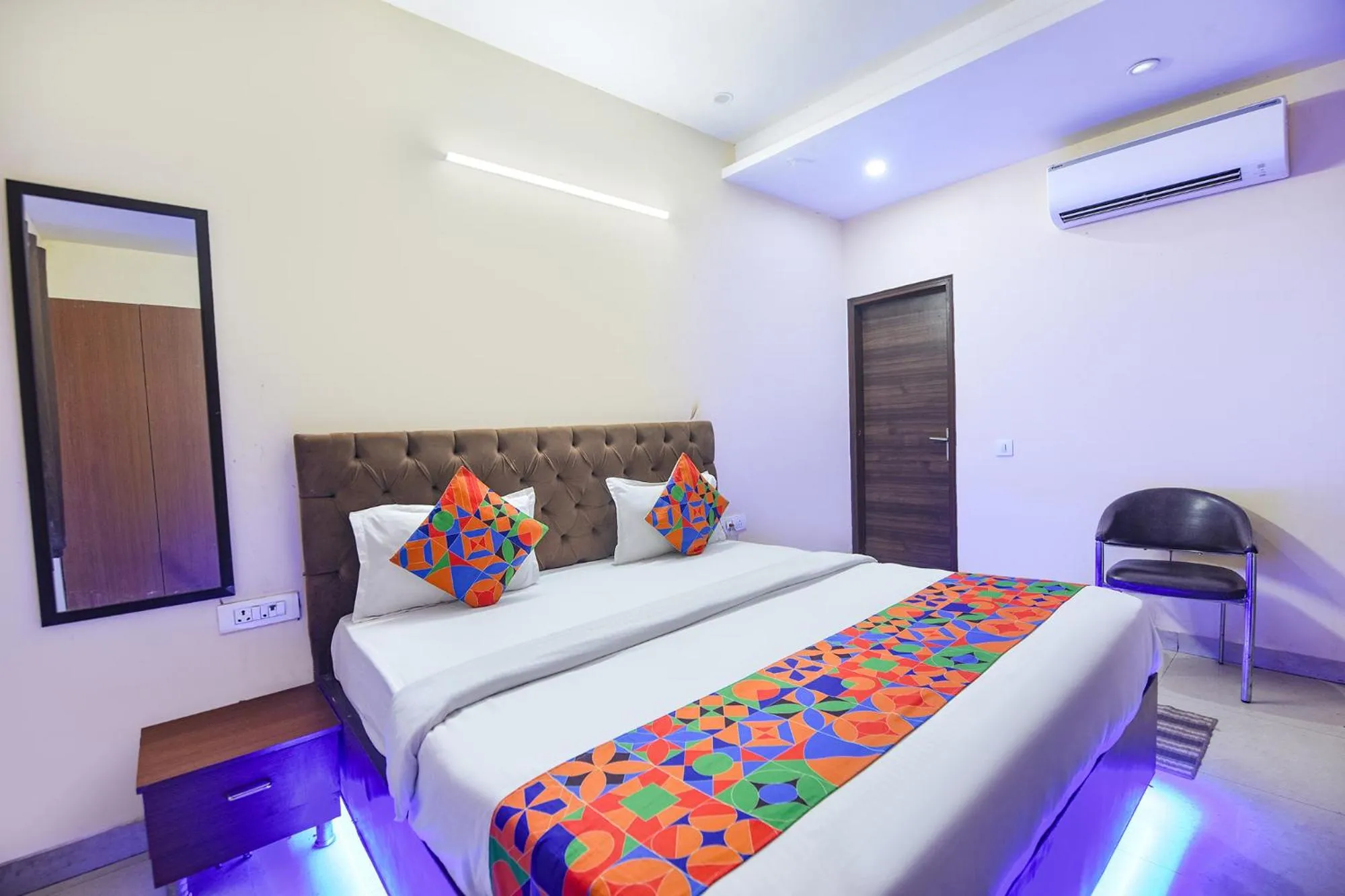 Bedroom in FabHotel Mannat Bhera Enclave