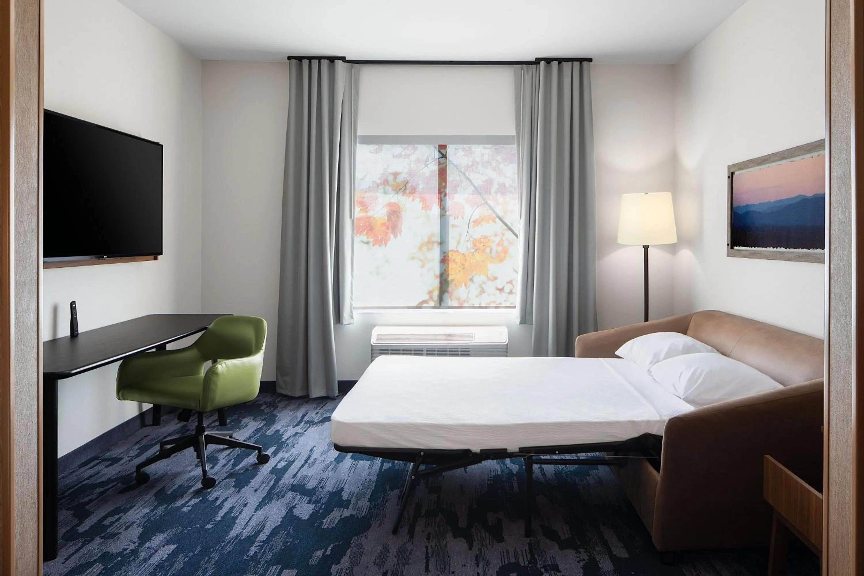 Photo of the whole room, Bed in Fairfield by Marriott Inn & Suites Whitsett Greensboro East