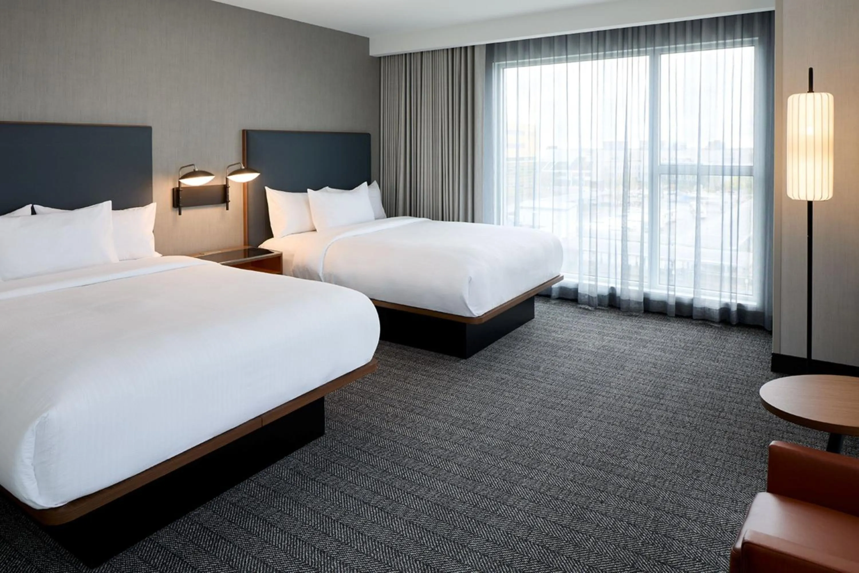Photo of the whole room, Bed in Courtyard by Marriott Montreal Laval