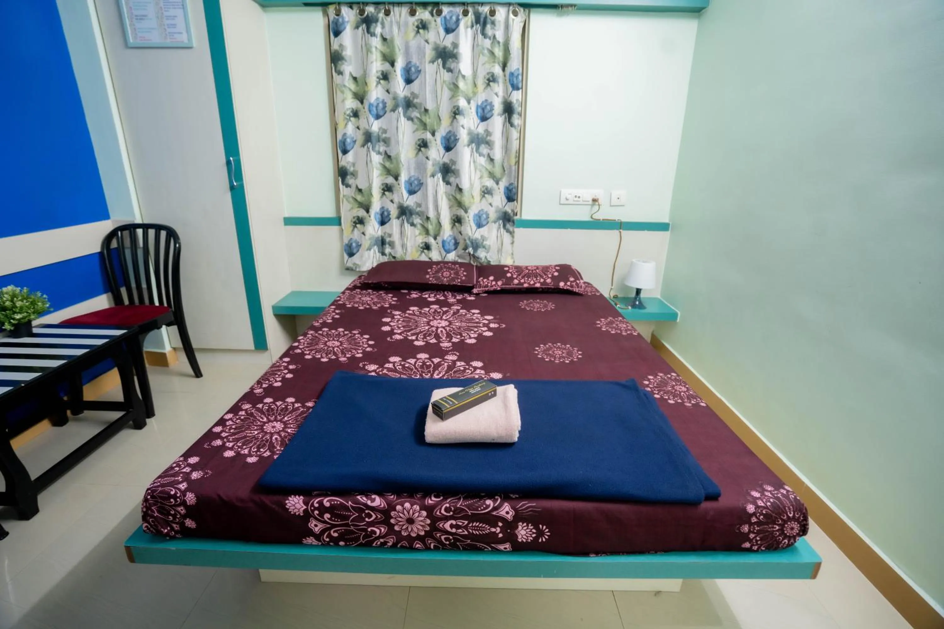 Bedroom, Bed in Sree Theja Residency