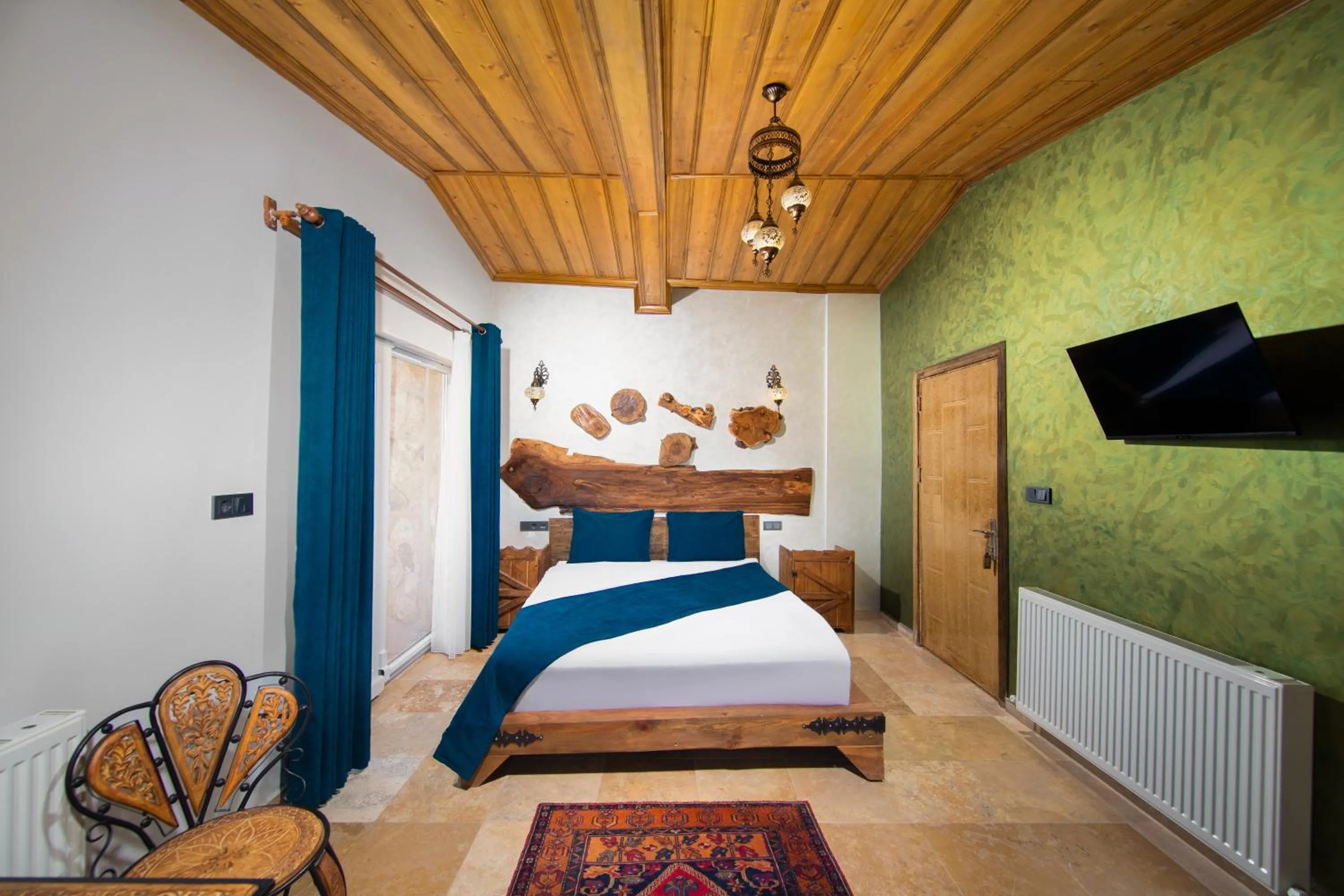 Communal lounge/ TV room, Bed in Moonlight of Cappadocia