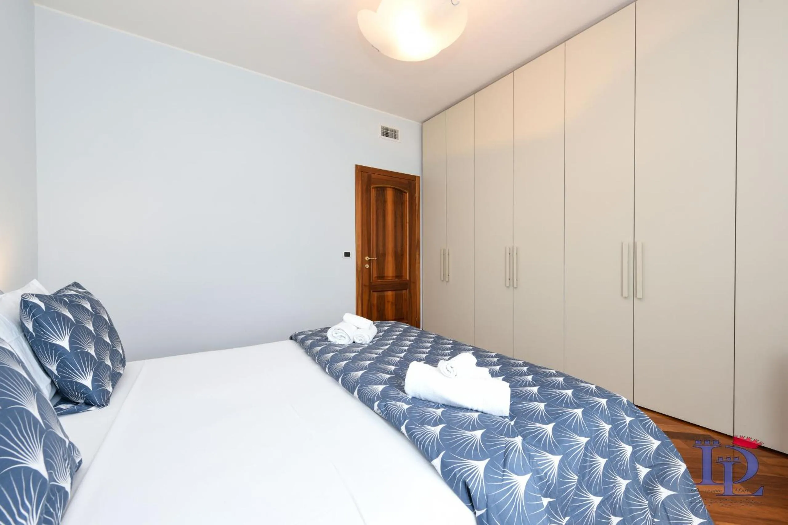 Bed in Splendido Apartment DesenzanoLoft Official Partner Homes & Villas by Marriott Bonvoy