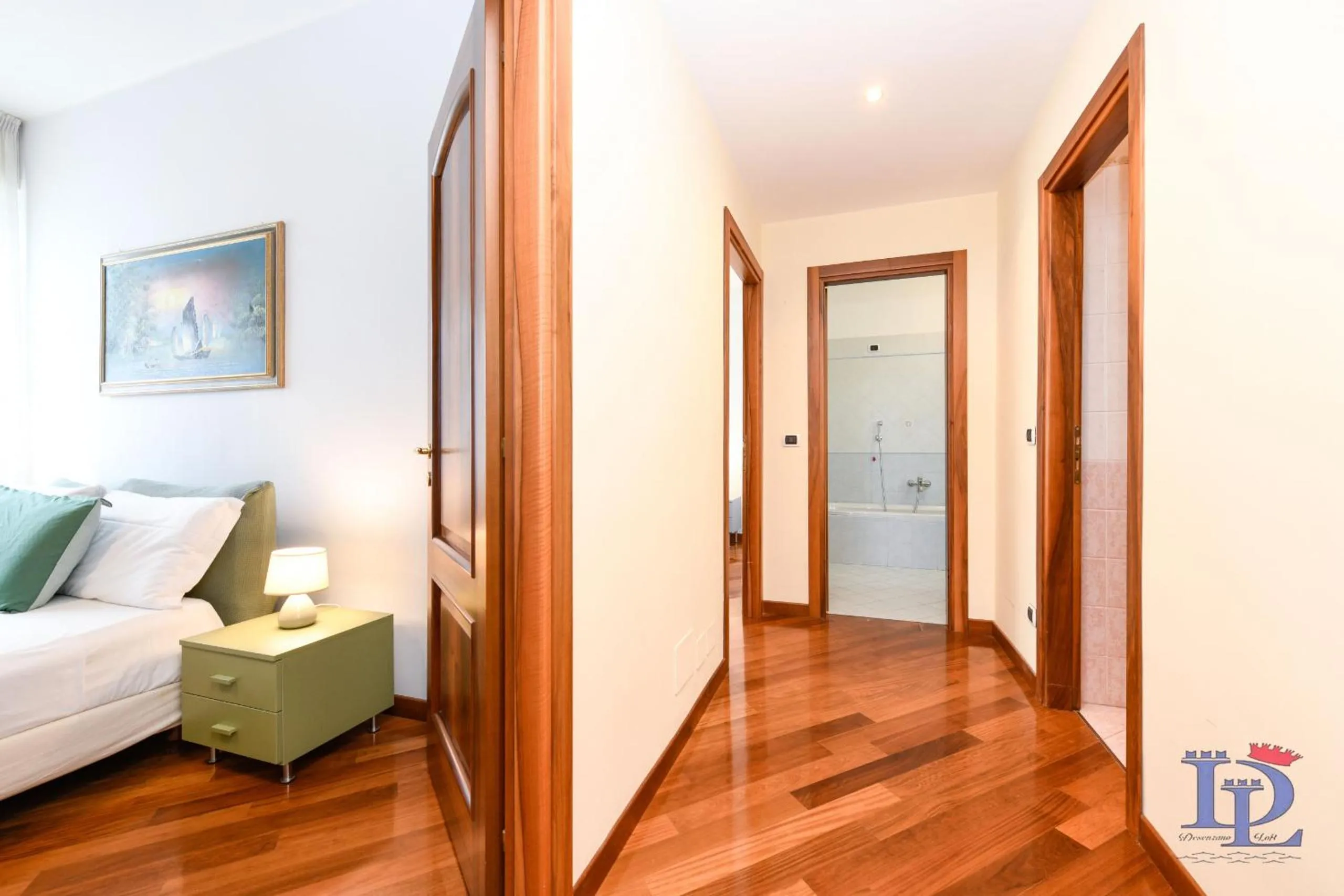 Decorative detail, Bed in Splendido Apartment DesenzanoLoft Official Partner Homes & Villas by Marriott Bonvoy