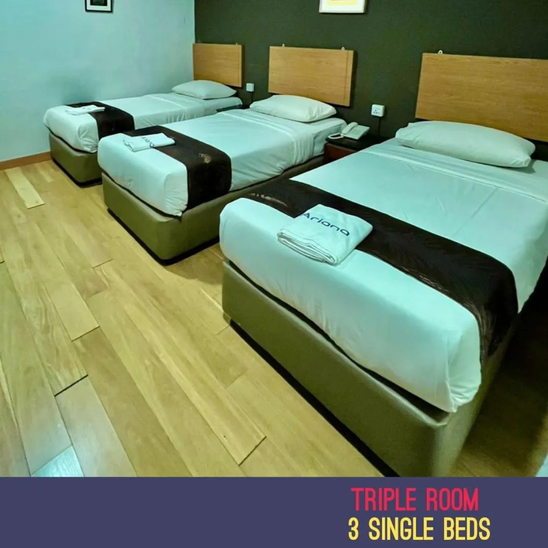 Bed in Golden Leaf Boutique Hotel Nusa Idaman Formerly Known as Ariana Hotel