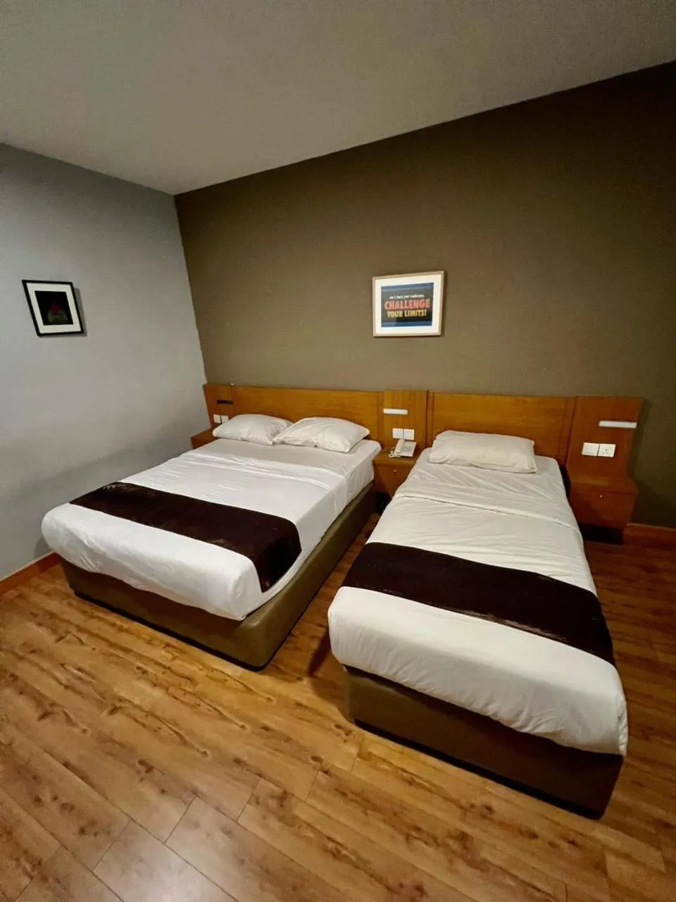 Bed in Golden Leaf Boutique Hotel Nusa Idaman Formerly Known as Ariana Hotel