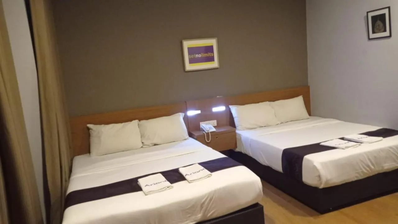 Bed in Golden Leaf Boutique Hotel Nusa Idaman Formerly Known as Ariana Hotel