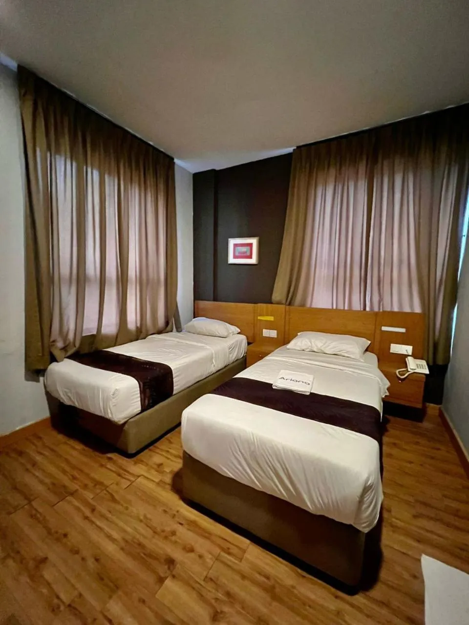 Bed in Golden Leaf Boutique Hotel Nusa Idaman Formerly Known as Ariana Hotel