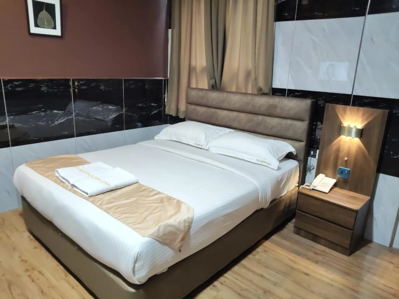Bed in Golden Leaf Boutique Hotel Nusa Idaman Formerly Known as Ariana Hotel