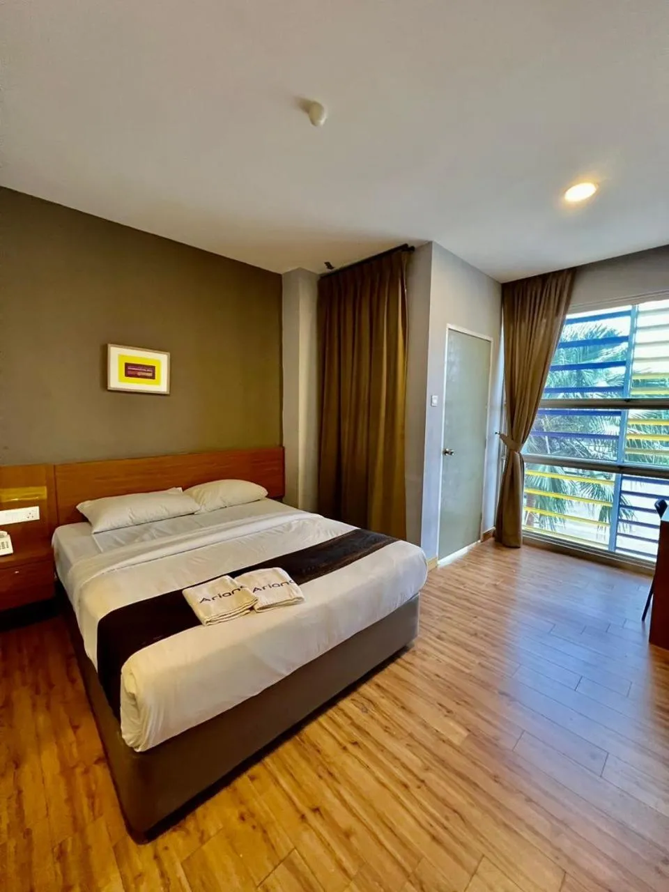 Bed in Golden Leaf Boutique Hotel Nusa Idaman Formerly Known as Ariana Hotel