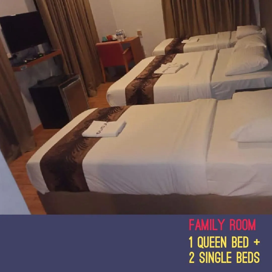 Bed in Golden Leaf Boutique Hotel Nusa Idaman Formerly Known as Ariana Hotel