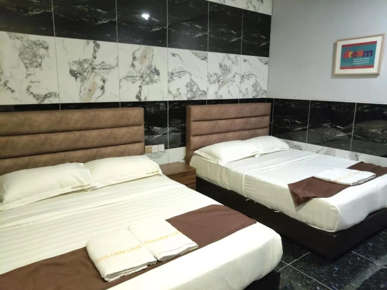 Bed in Golden Leaf Boutique Hotel Nusa Idaman Formerly Known as Ariana Hotel