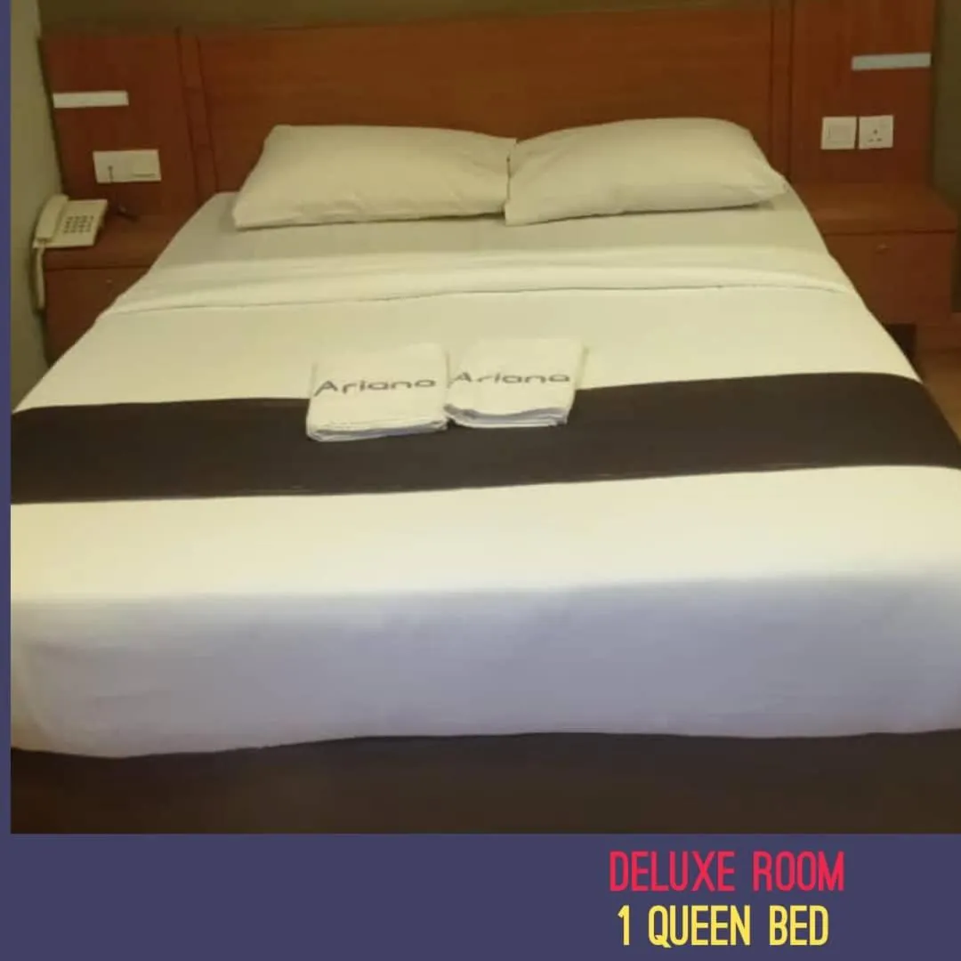 Bed in Golden Leaf Boutique Hotel Nusa Idaman Formerly Known as Ariana Hotel