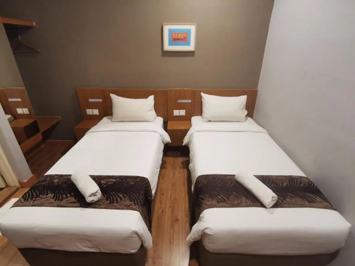 Bed in Golden Leaf Boutique Hotel Nusa Idaman Formerly Known as Ariana Hotel