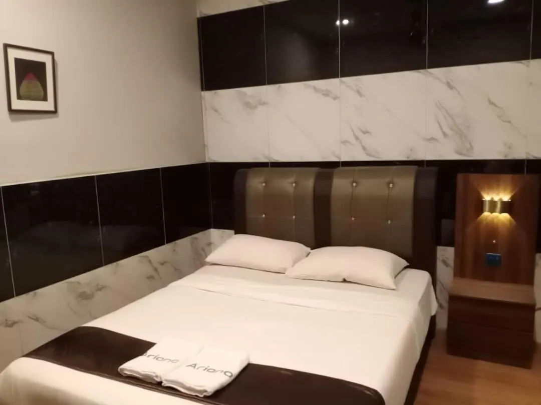 Bed in Golden Leaf Boutique Hotel Nusa Idaman Formerly Known as Ariana Hotel