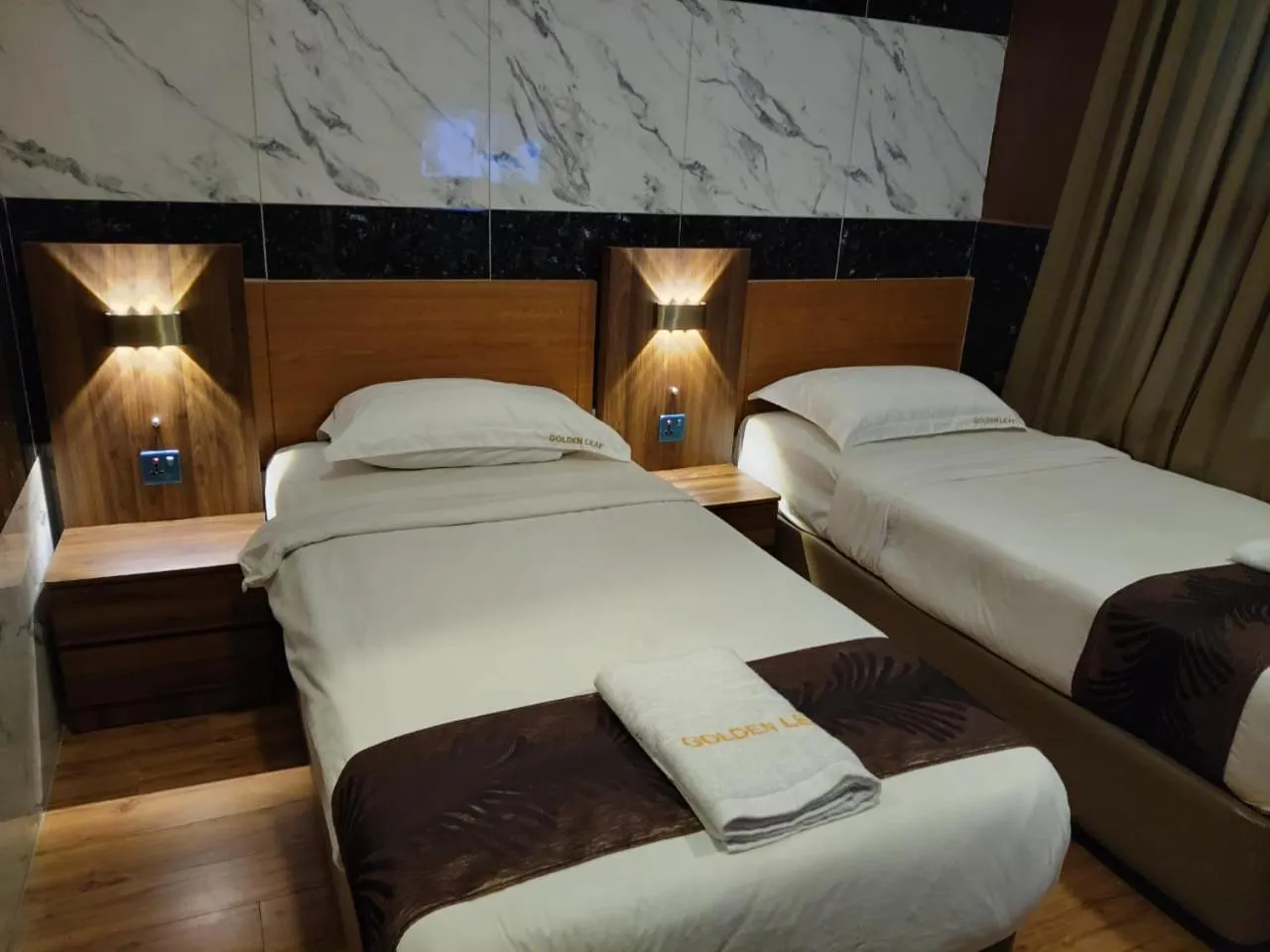 Bed in Golden Leaf Boutique Hotel Nusa Idaman Formerly Known as Ariana Hotel