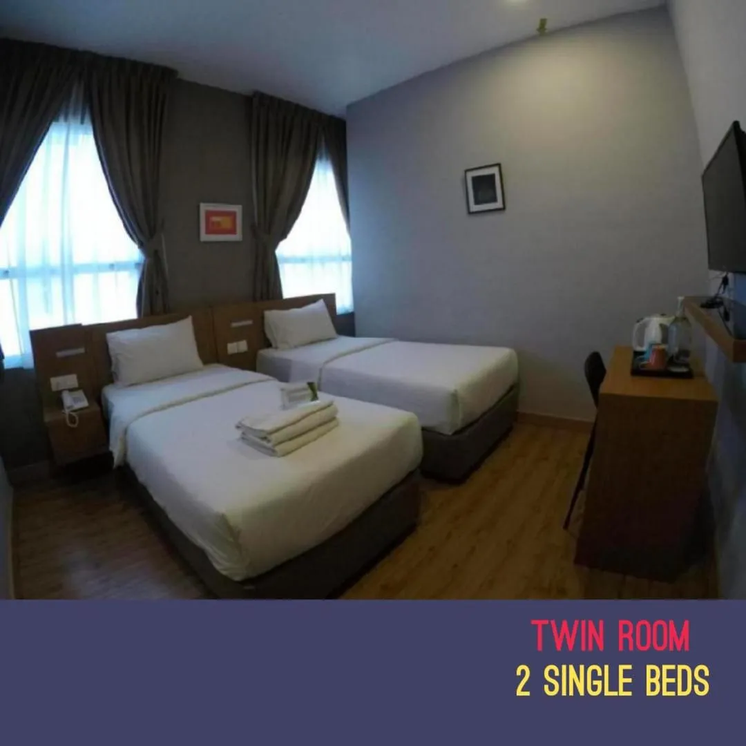 Bed in Golden Leaf Boutique Hotel Nusa Idaman Formerly Known as Ariana Hotel