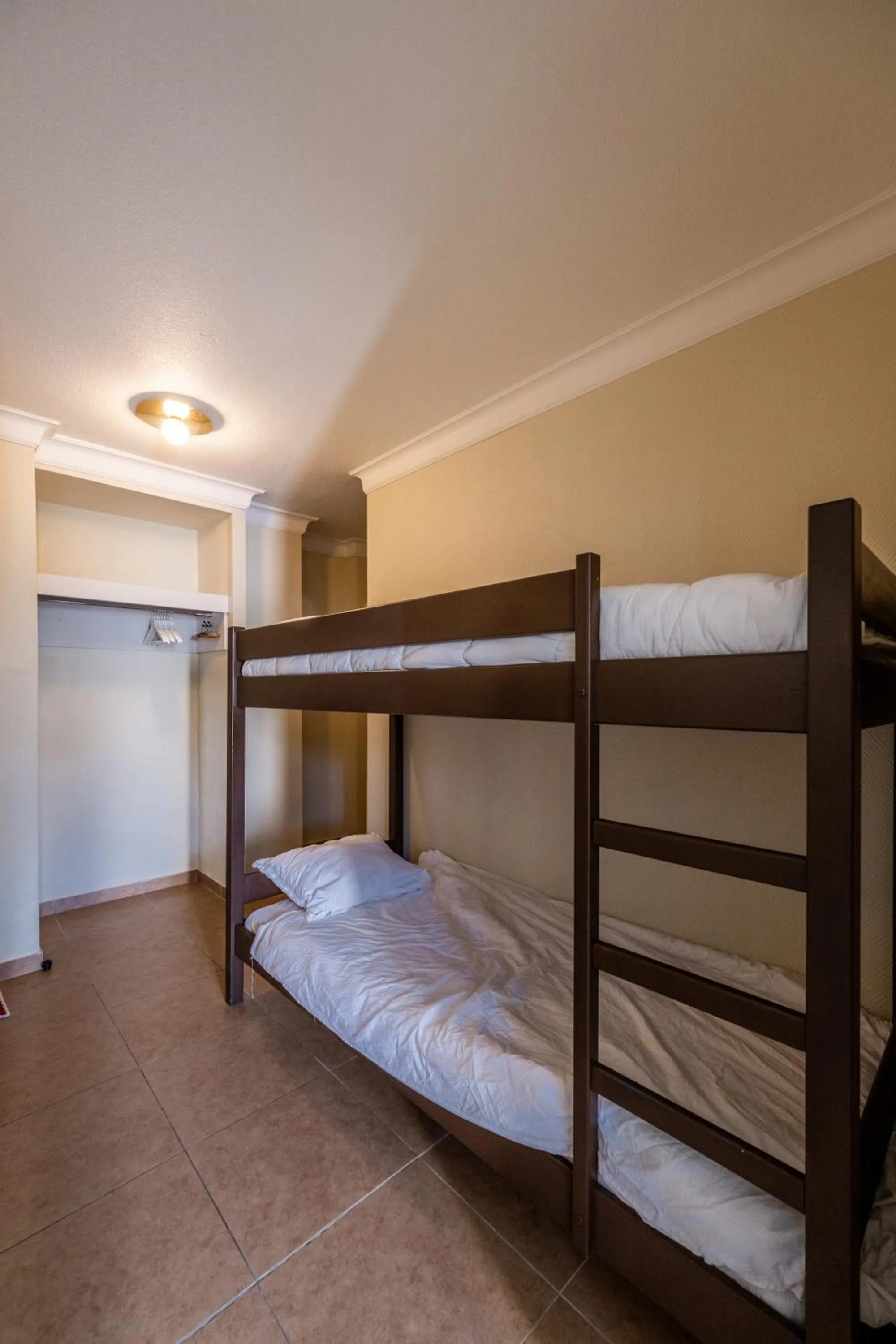 Bedroom, Bed in Résidence Château d'Acotz - Appartements avec piscine à 300m des Plages & Océan