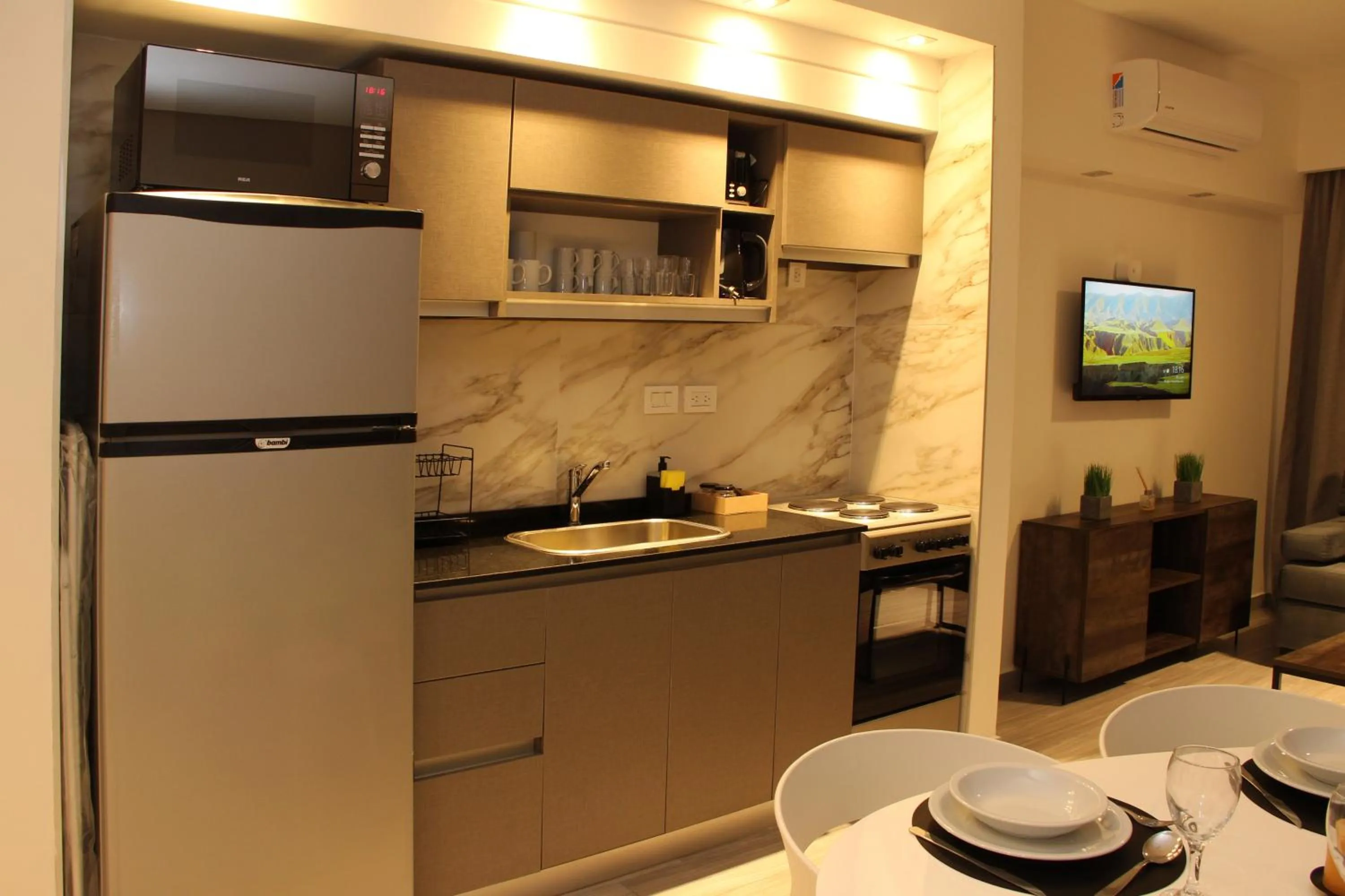 Kitchen or kitchenette in In House BA - Le coq