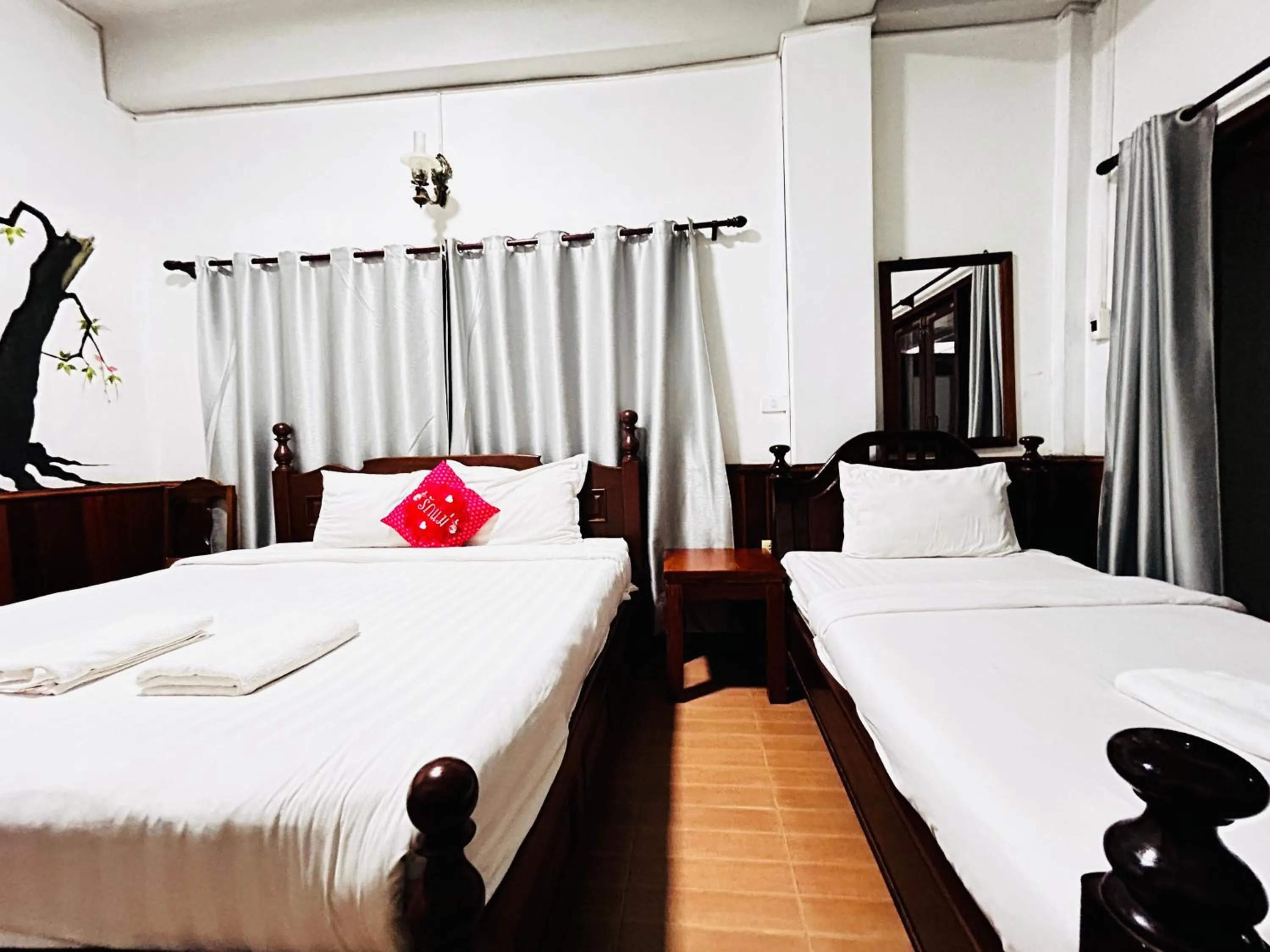 Bed in Domon Riverside Hotel