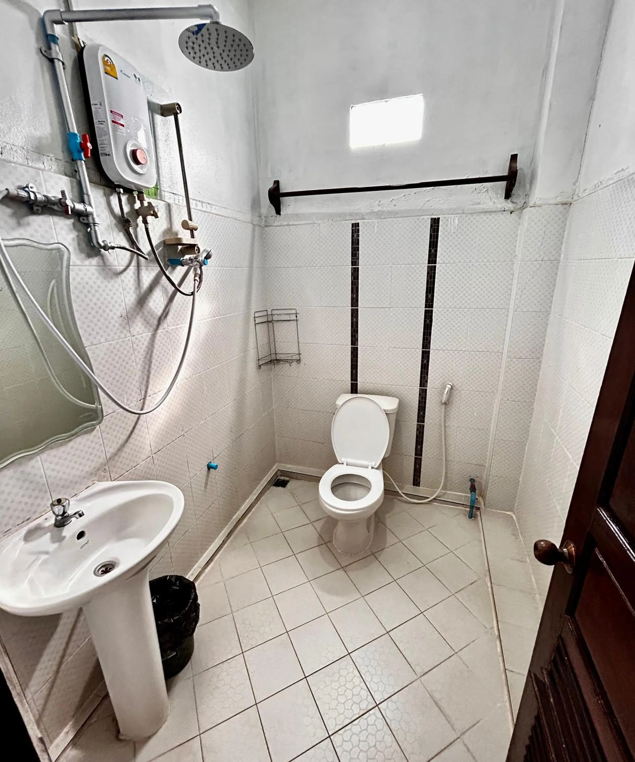 Shower in Domon Riverside Hotel