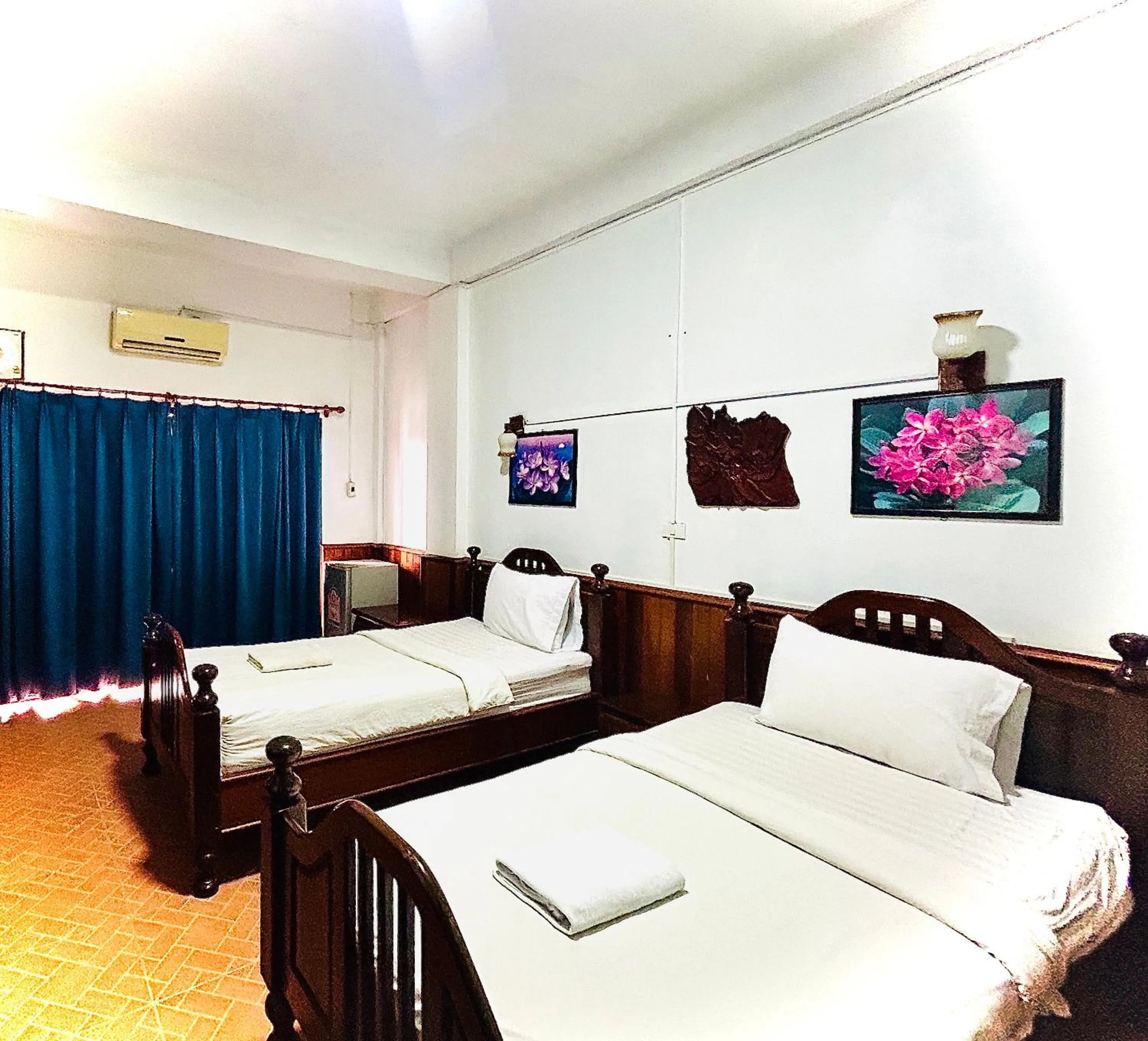 Bed in Domon Riverside Hotel