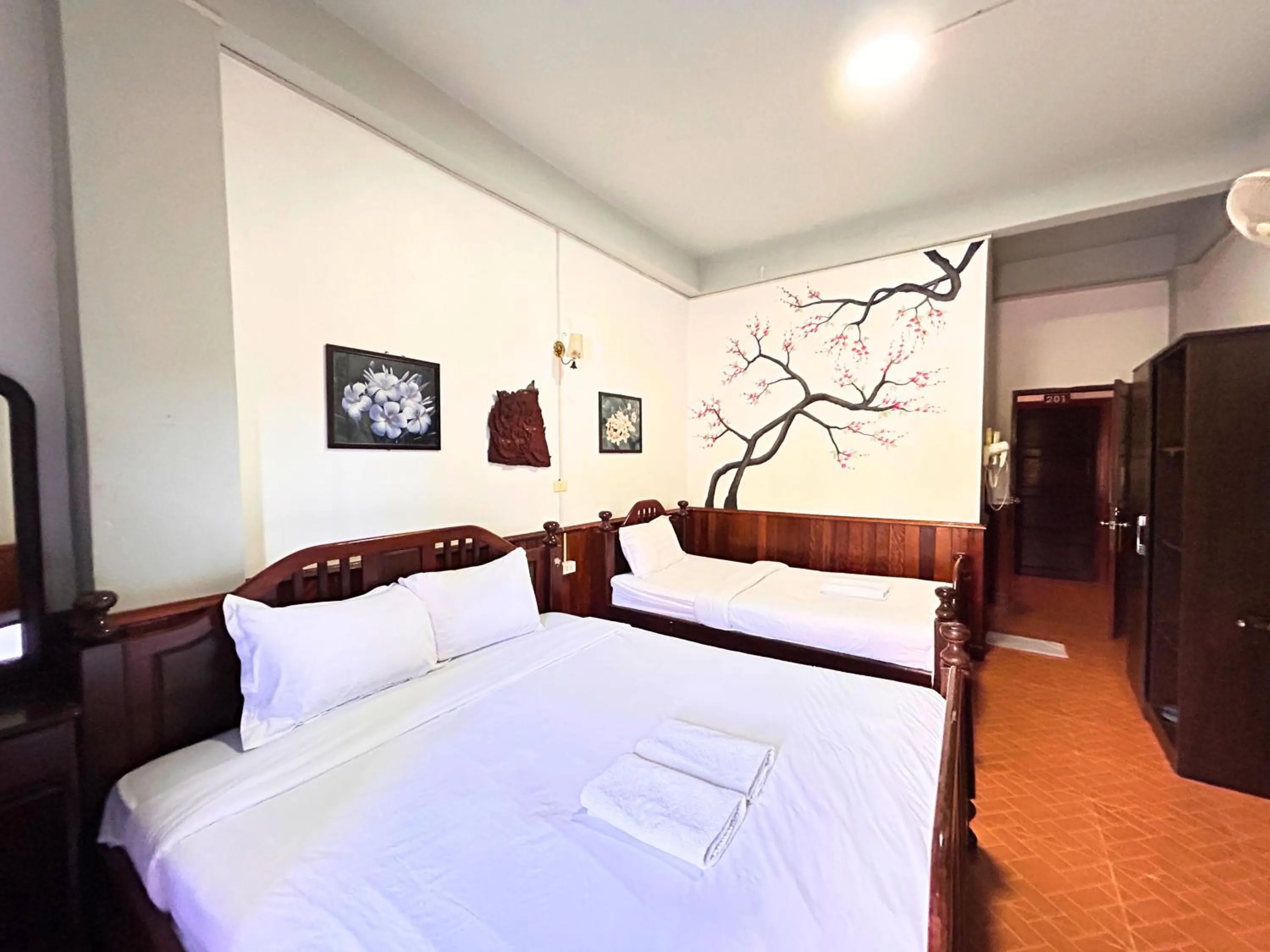 Bed in Domon Riverside Hotel