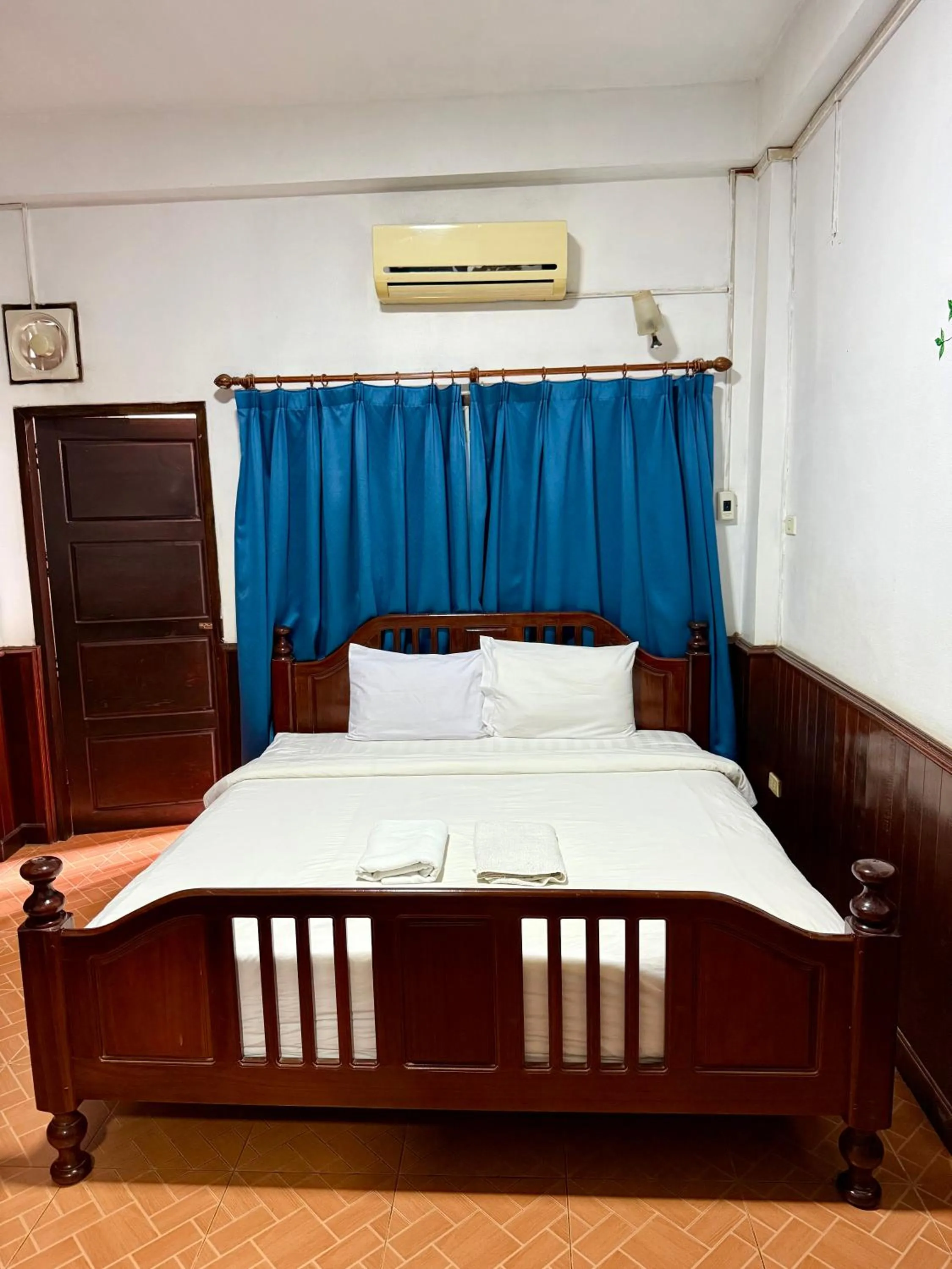 Bed in Domon Riverside Hotel