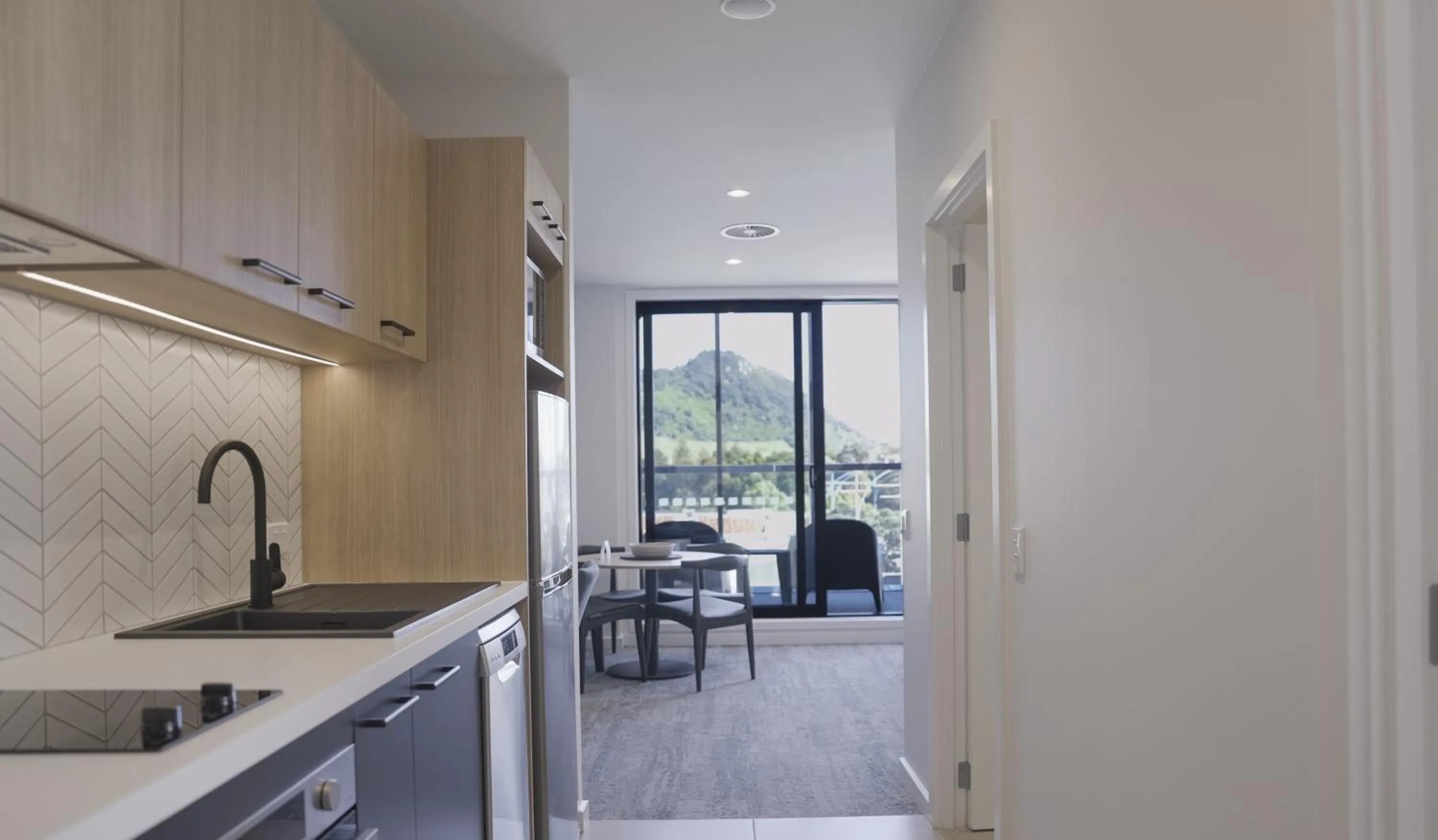 Kitchen or kitchenette in Quest Mt Maunganui