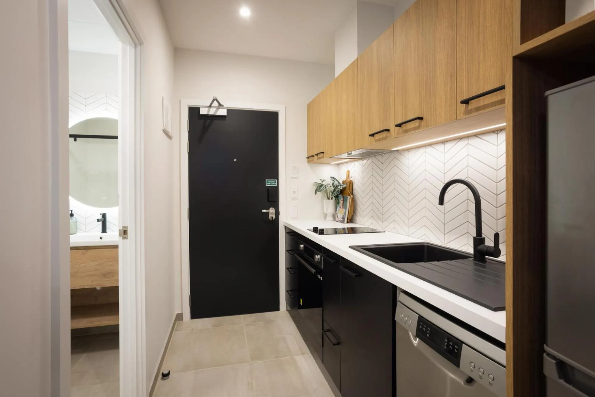Kitchen or kitchenette in Quest Mt Maunganui