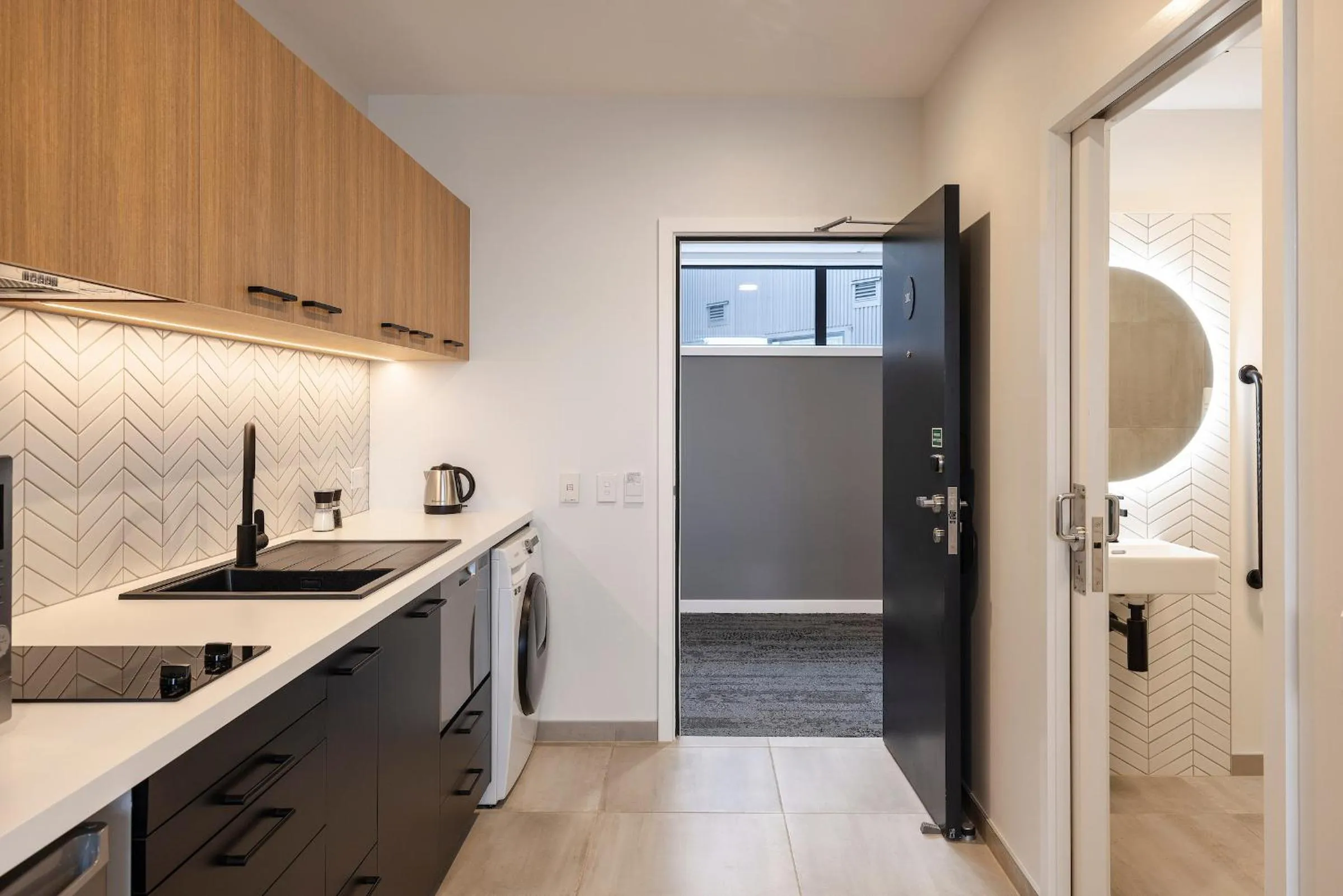 Kitchen or kitchenette in Quest Mt Maunganui