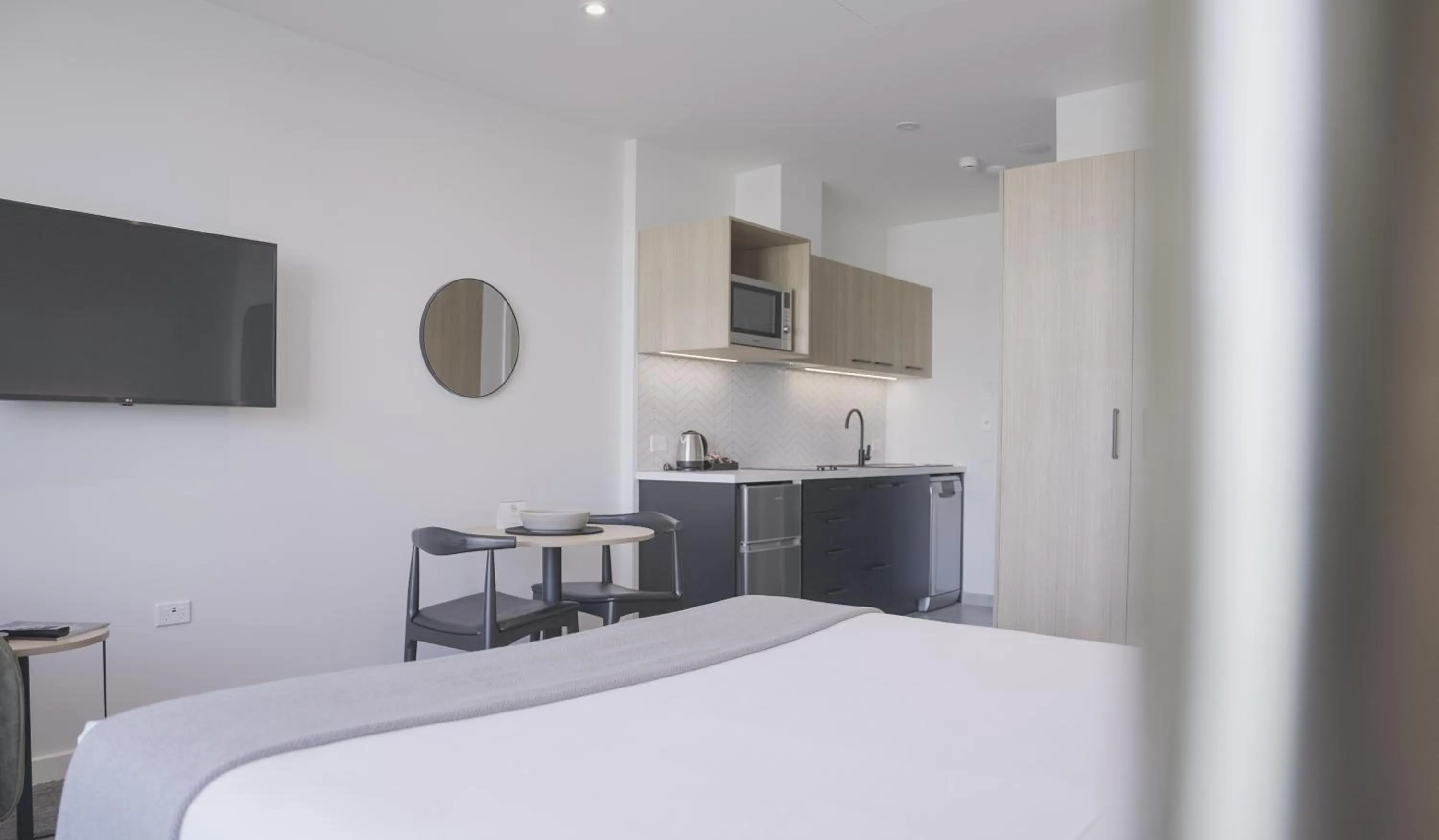 Bed in Quest Mt Maunganui