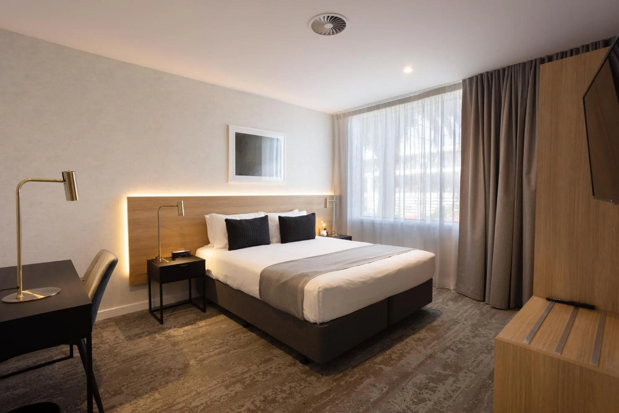 Bed in Quest Mt Maunganui