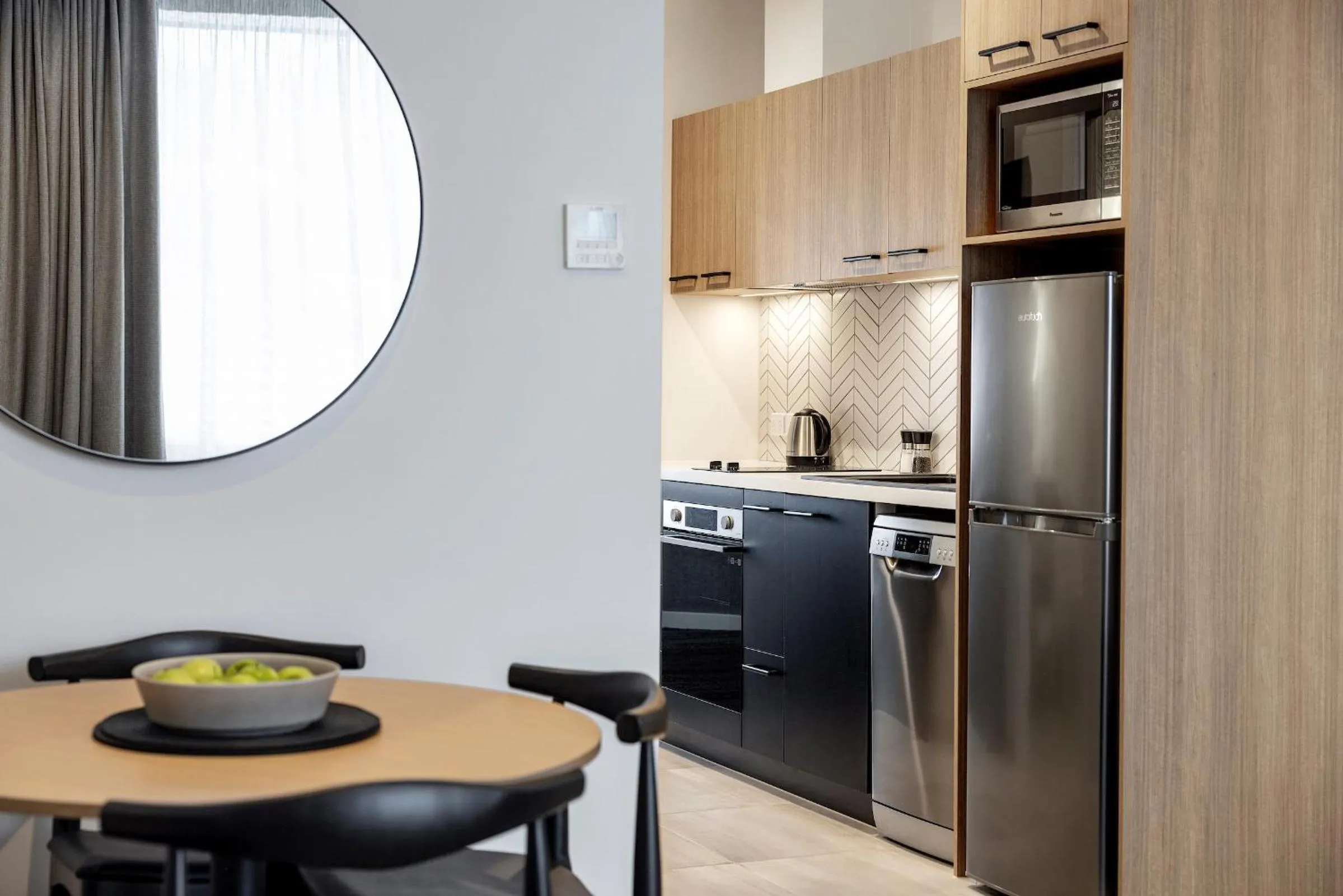 Kitchen or kitchenette in Quest Mt Maunganui