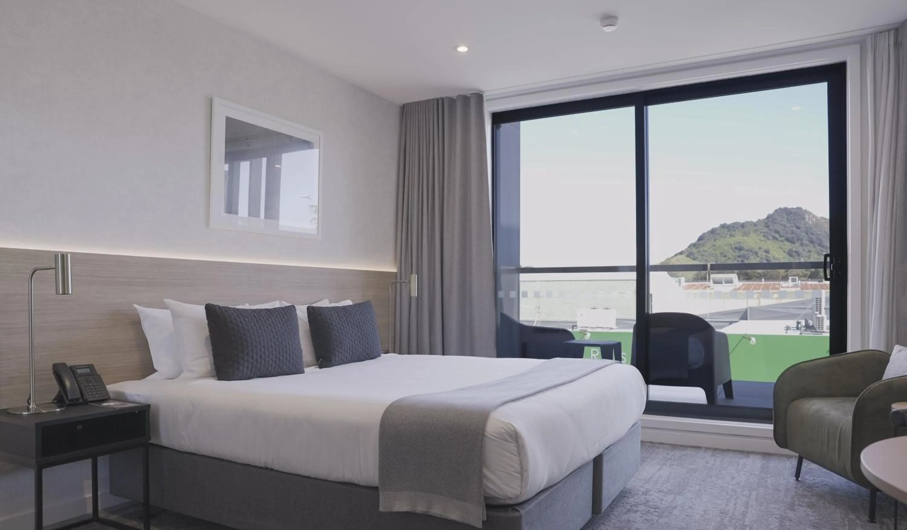 Bed in Quest Mt Maunganui