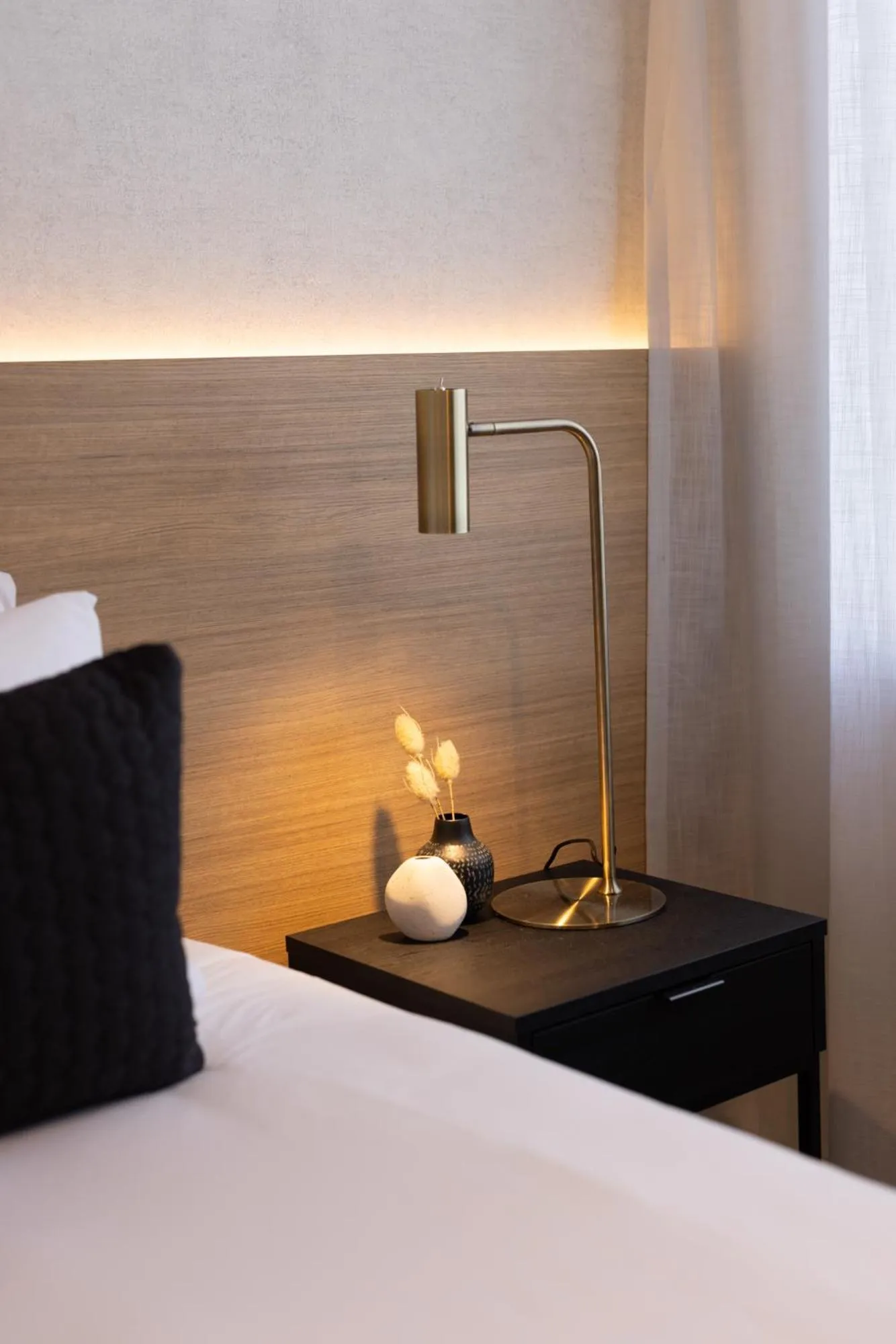 Bed in Quest Mt Maunganui