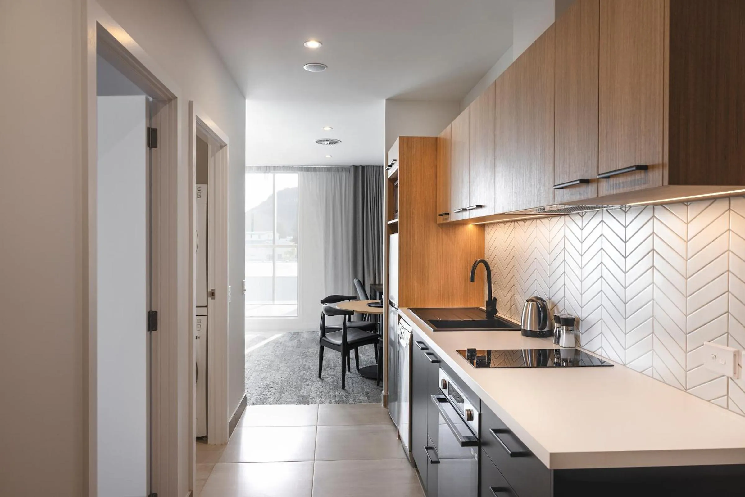 Kitchen or kitchenette in Quest Mt Maunganui